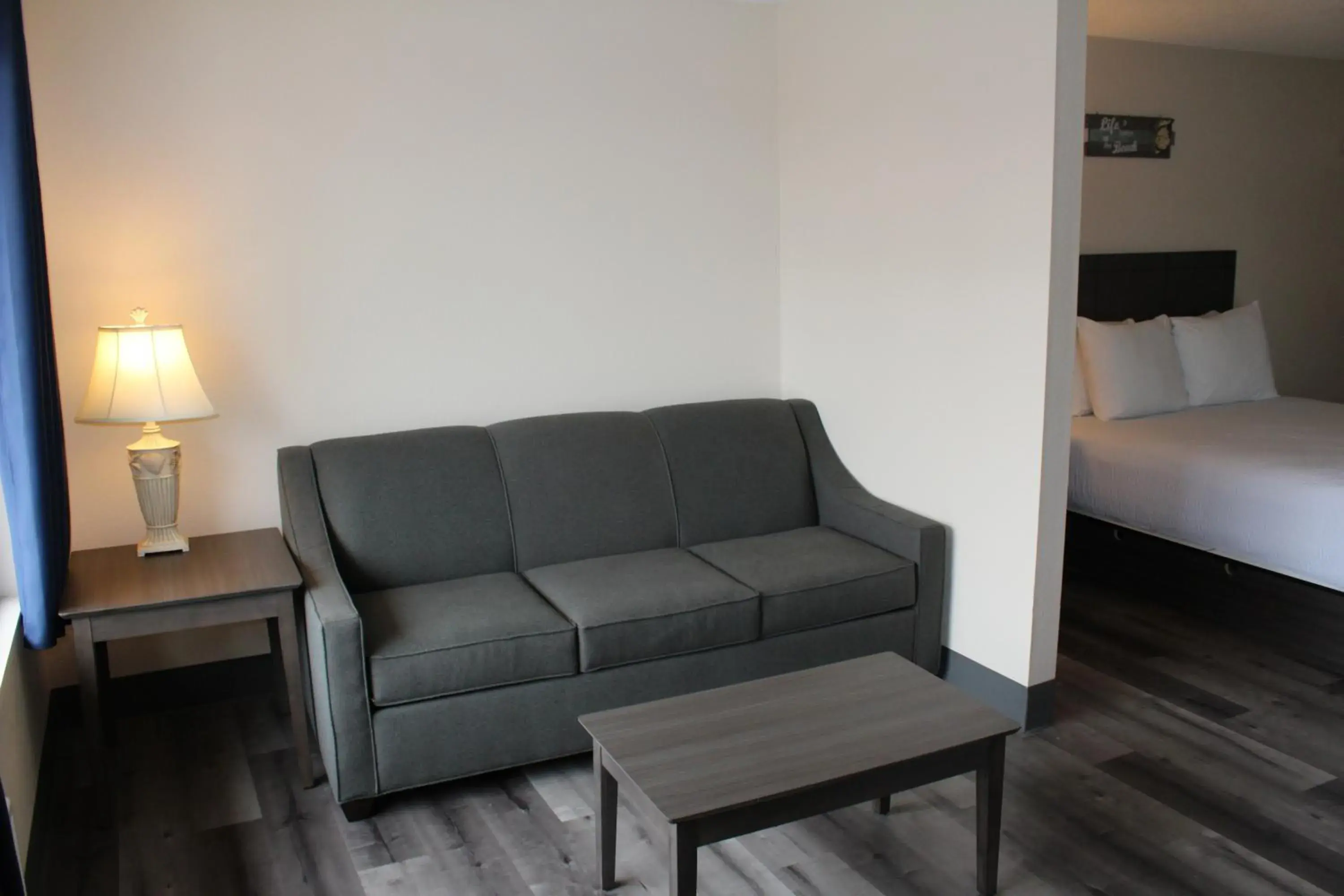 Bed, Seating Area in Inn at the Sea