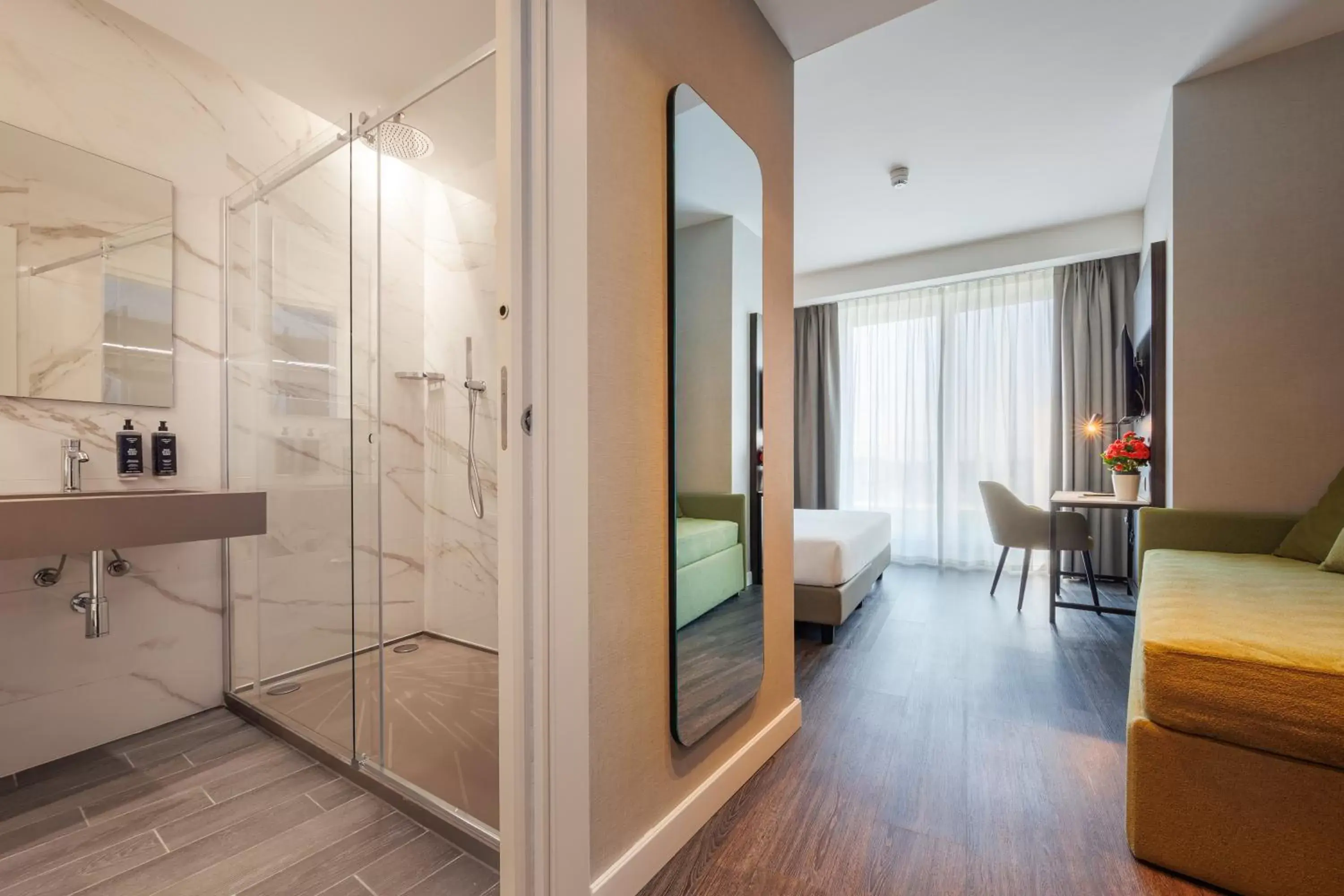 Bedroom in IH Hotels Milano Centrale