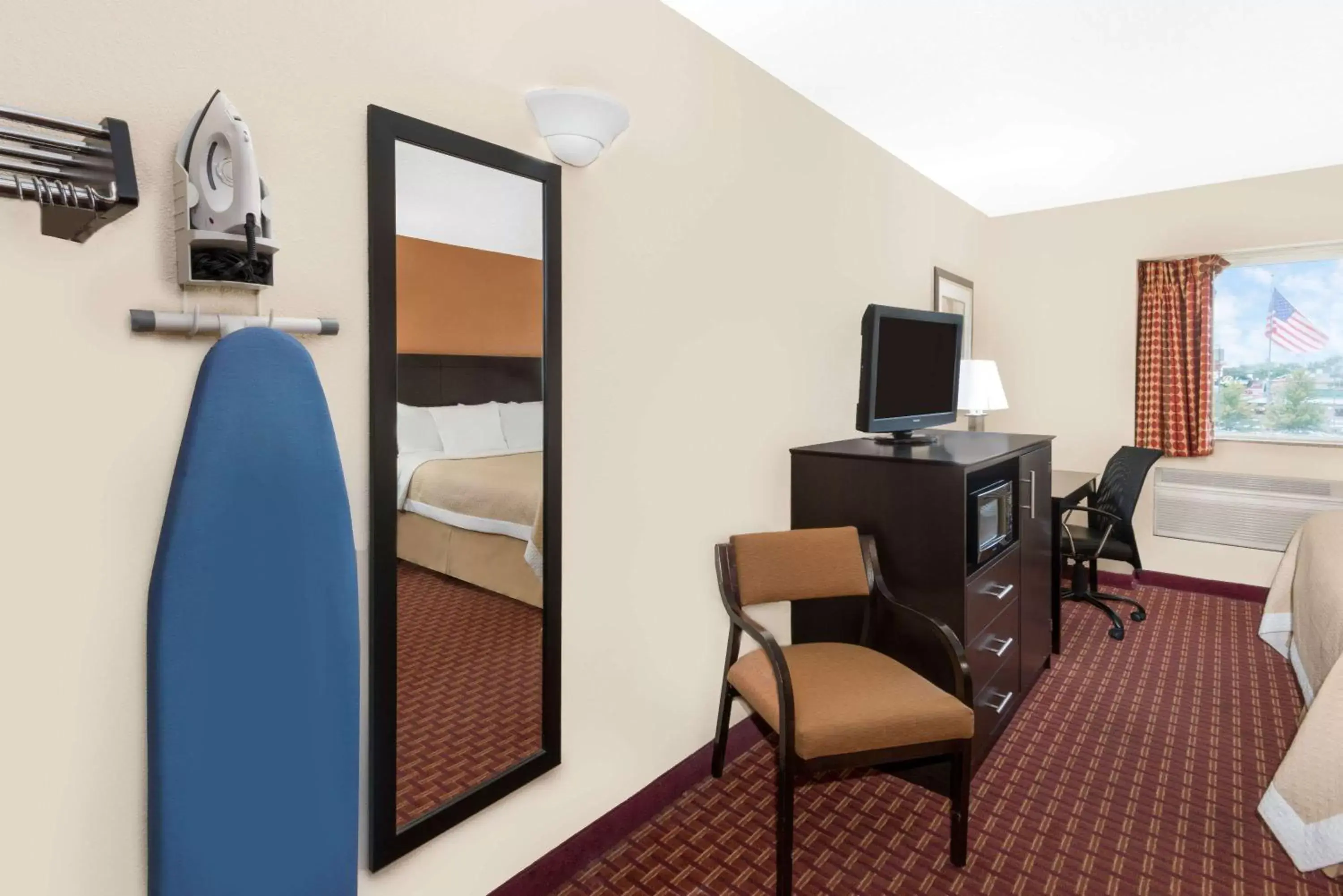 Photo of the whole room, TV/Entertainment Center in Days Inn by Wyndham Ames