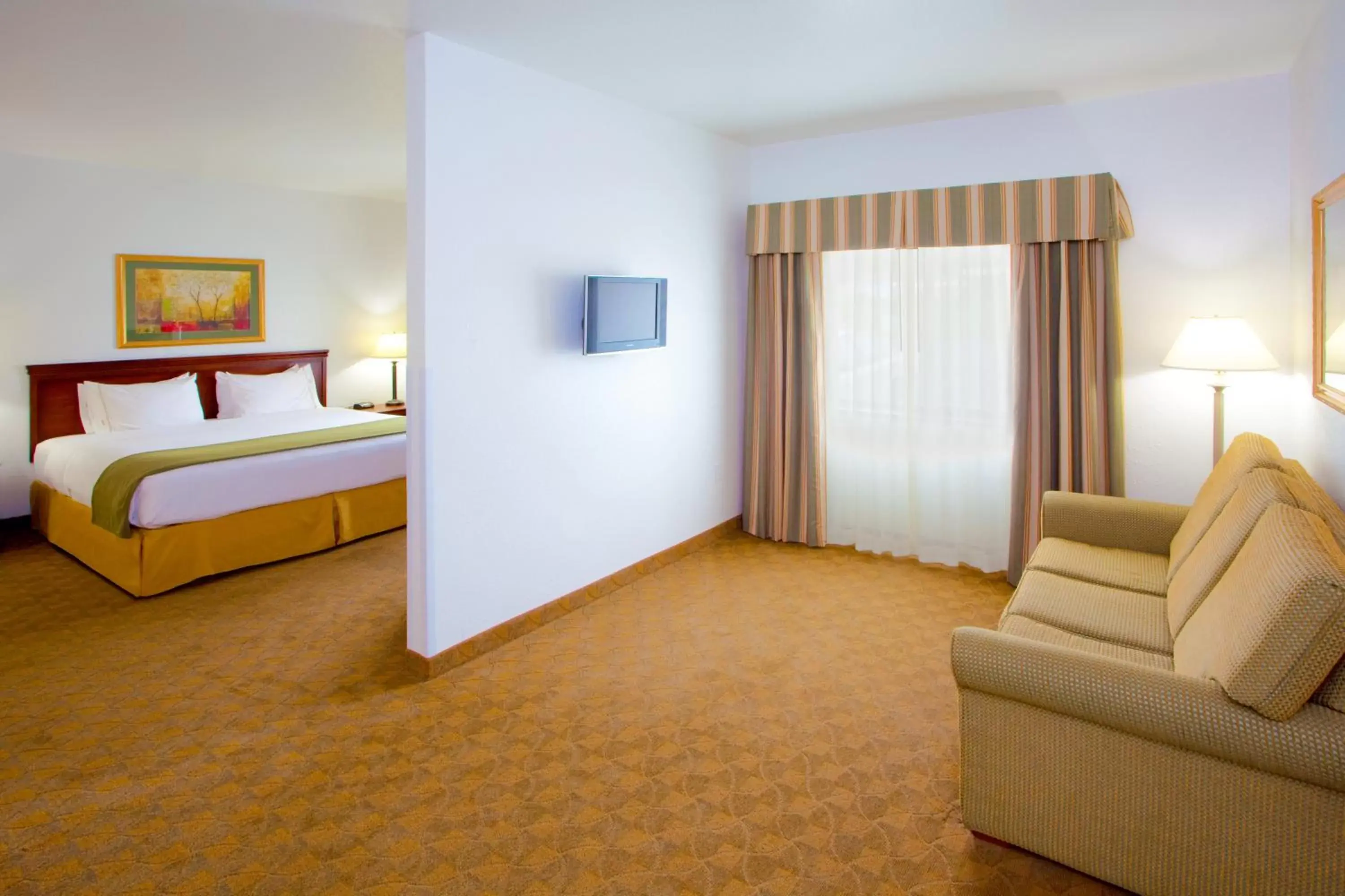 Bed in Holiday Inn Express Hotel & Suites Elkins, an IHG Hotel