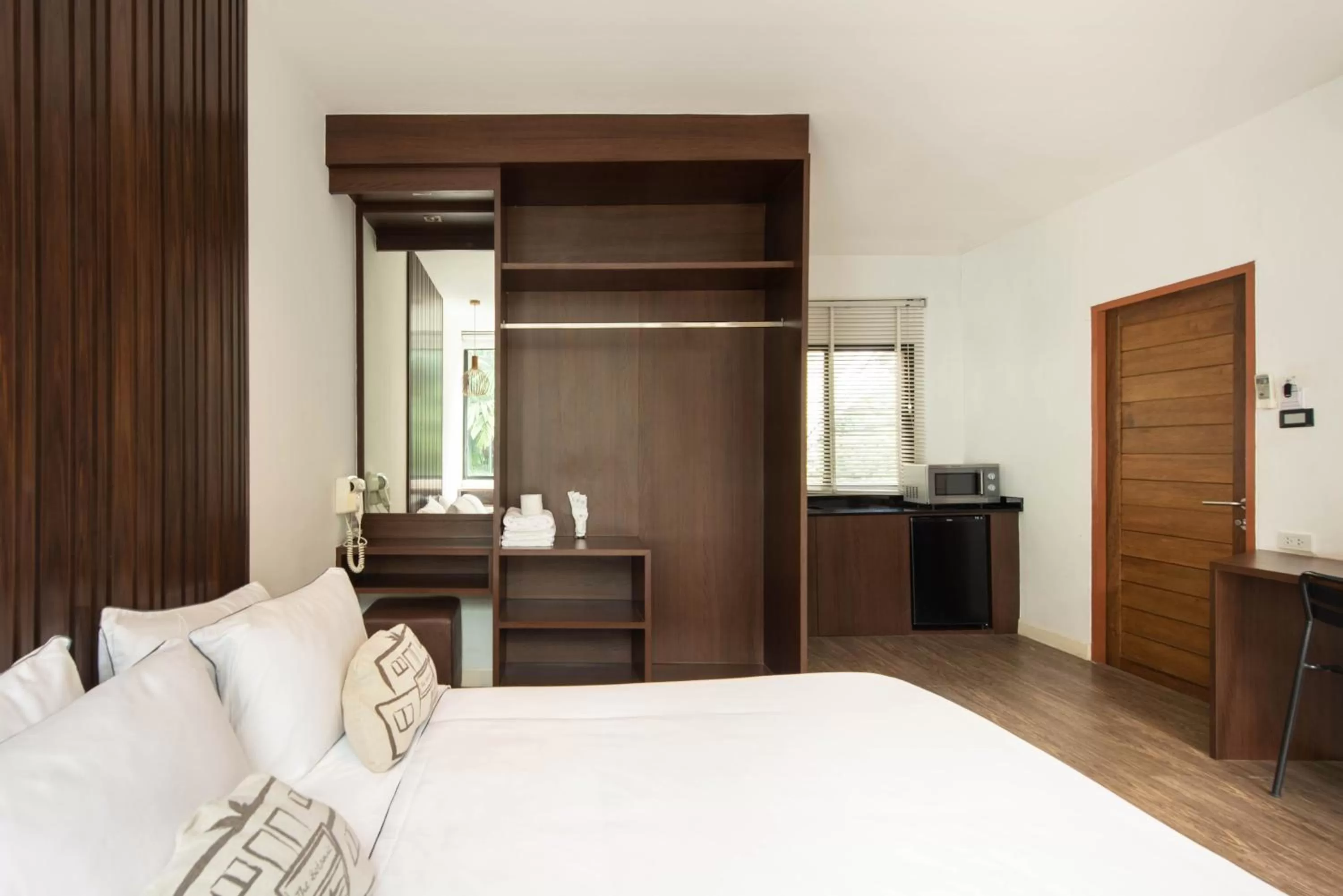 Bed in Botanic Service Room at Impact Muangthongthani - SHA Certified