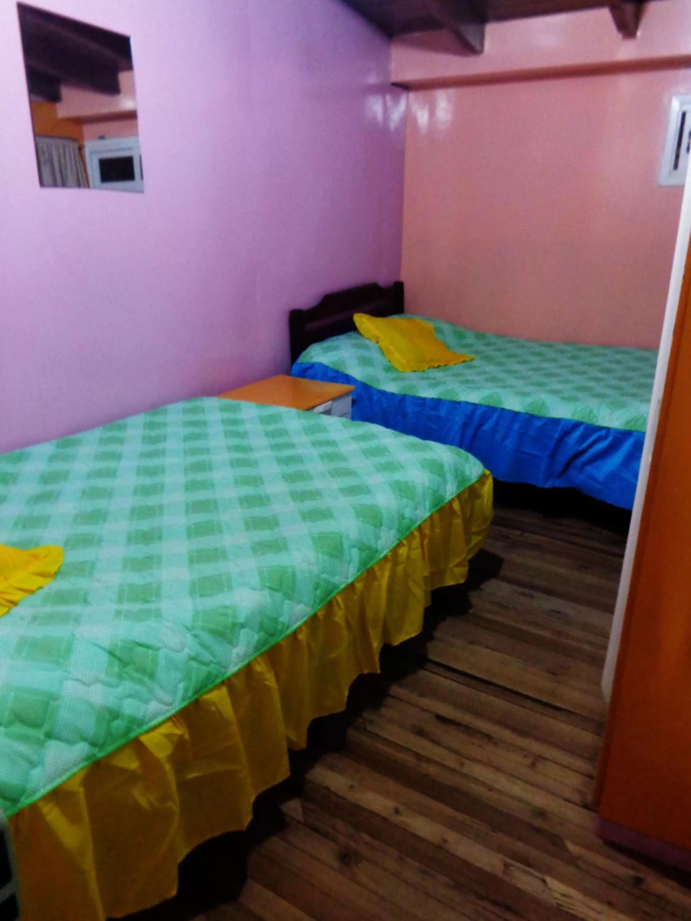 Bed in Hostal Yumbo Imperial