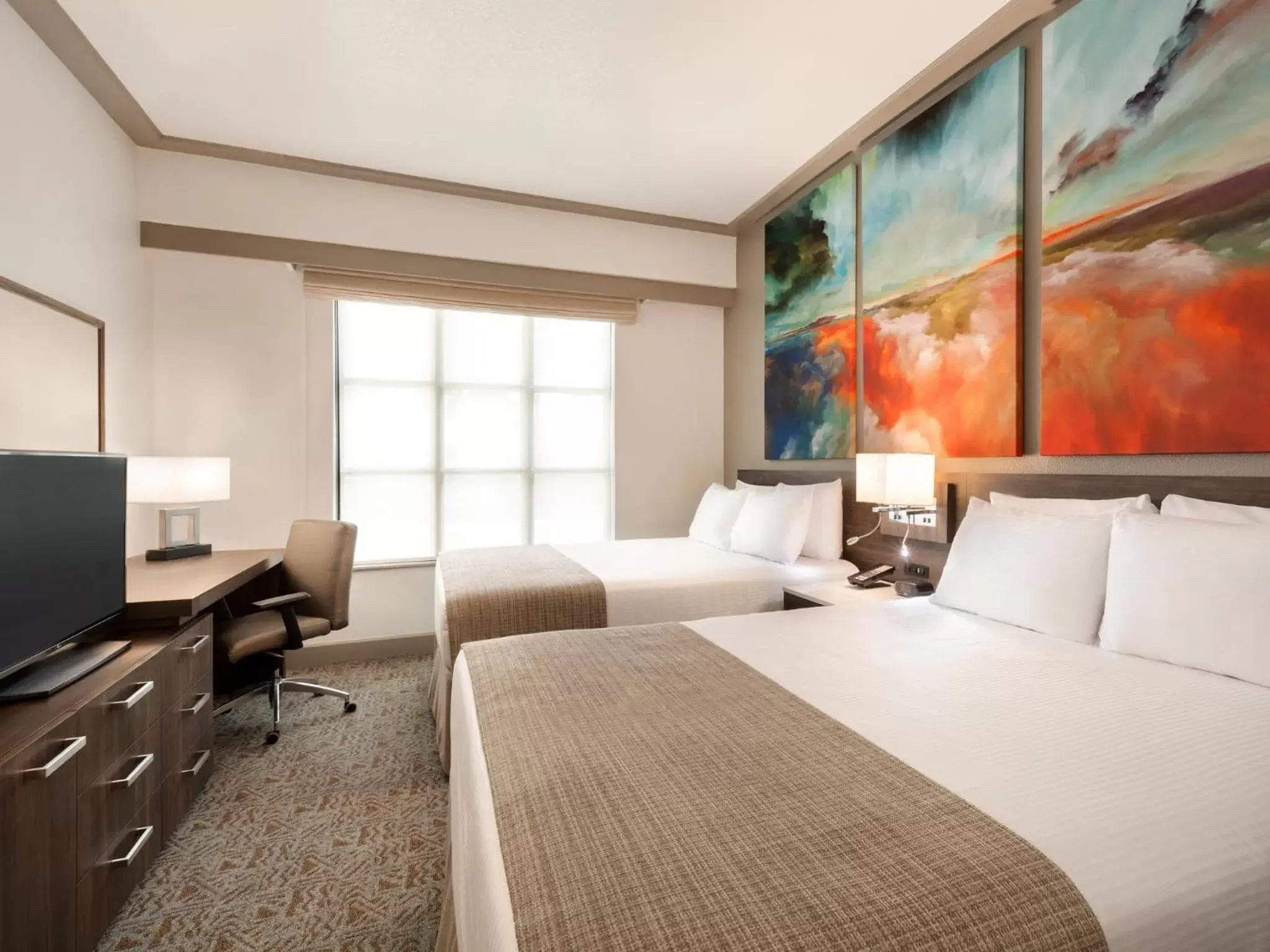 Bed in Buena Vista Suites Orlando