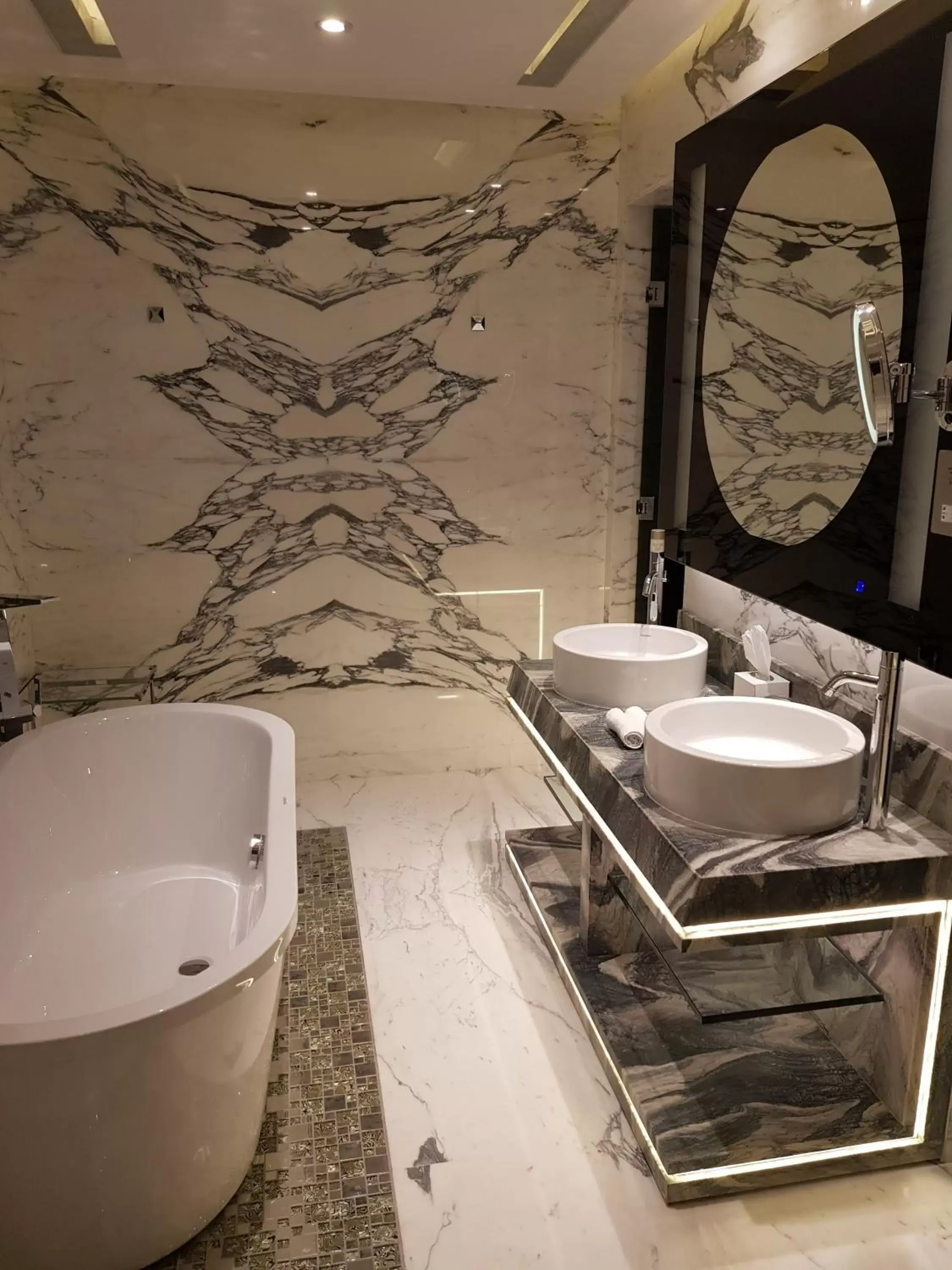 Patio, Bathroom in Royal M Hotel & Resort Abu Dhabi