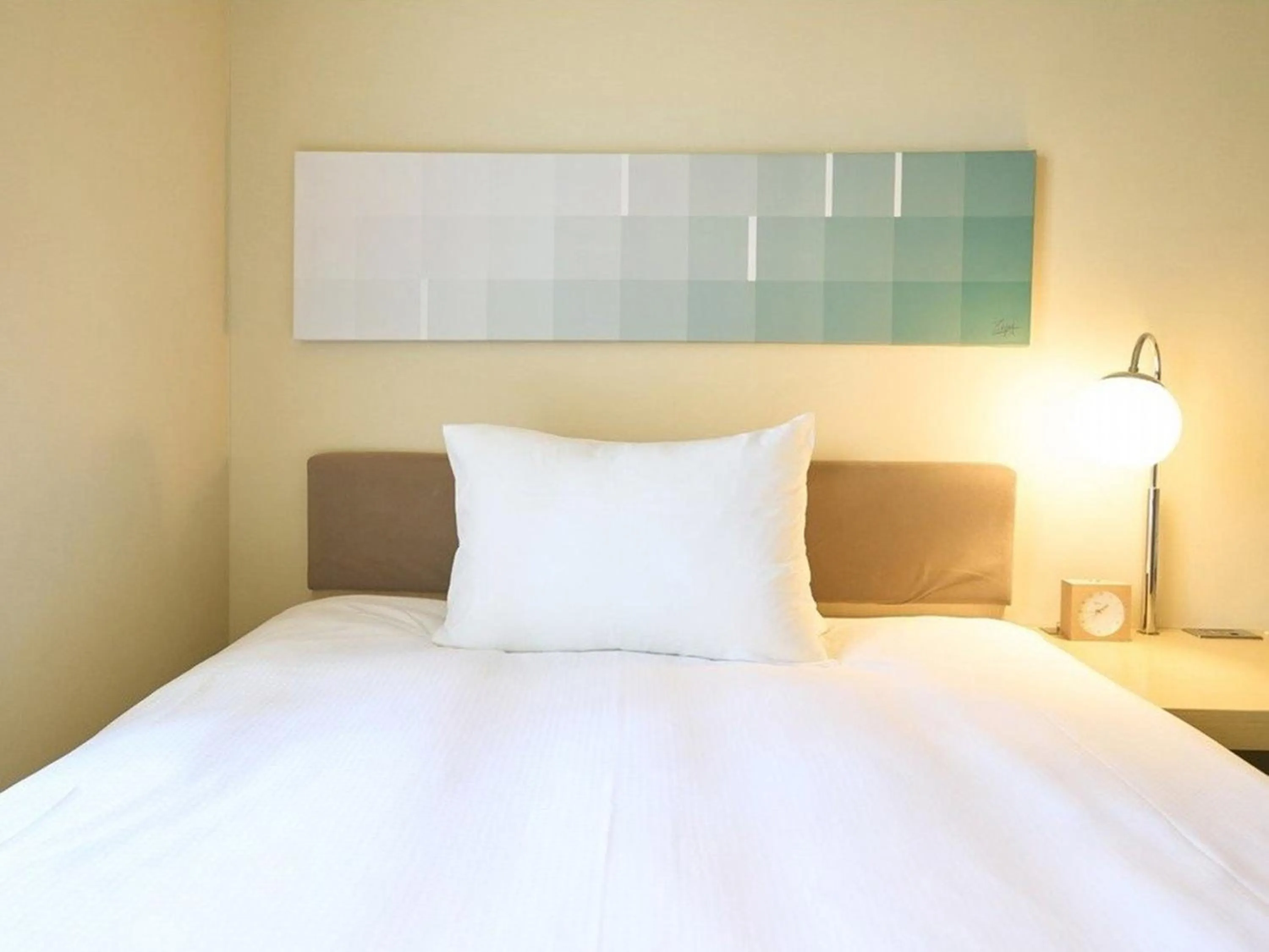 Bed in Hotel Resol Ikebukuro