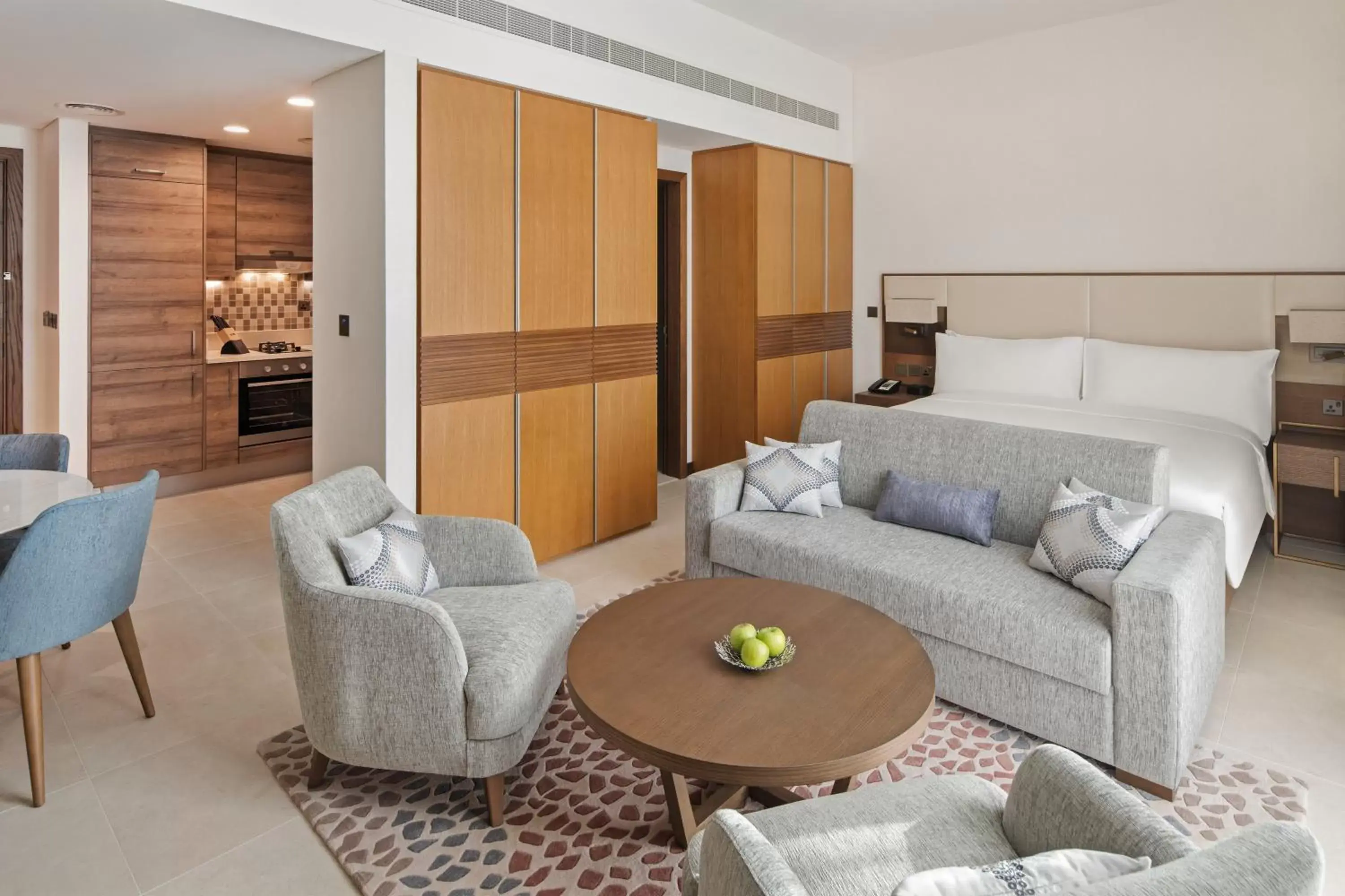 Living room, Seating Area in Staybridge Suites Dubai Al-Maktoum Airport, an IHG Hotel