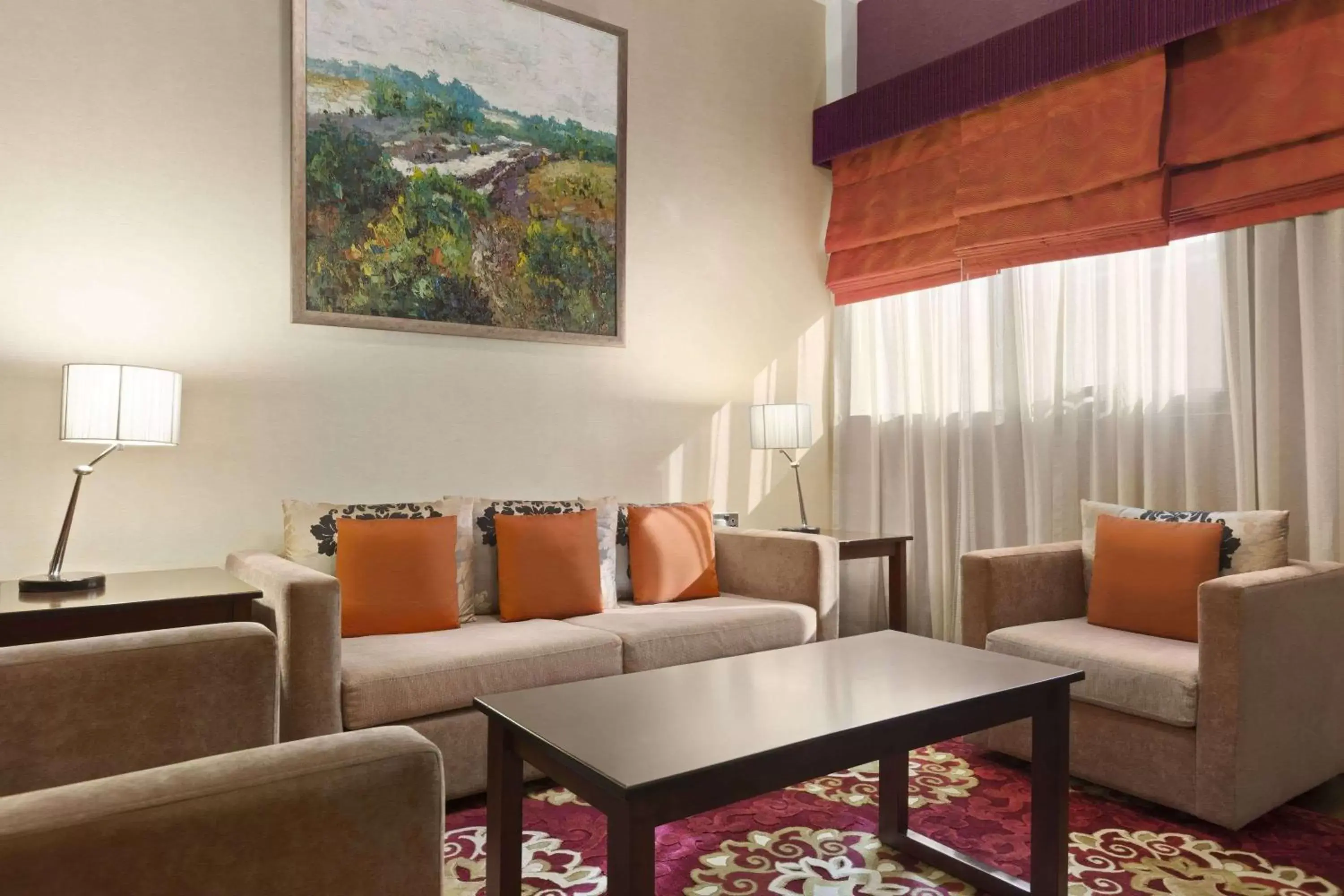 Lounge or bar, Seating Area in Ramada Hotel & Suites by Wyndham Ajman