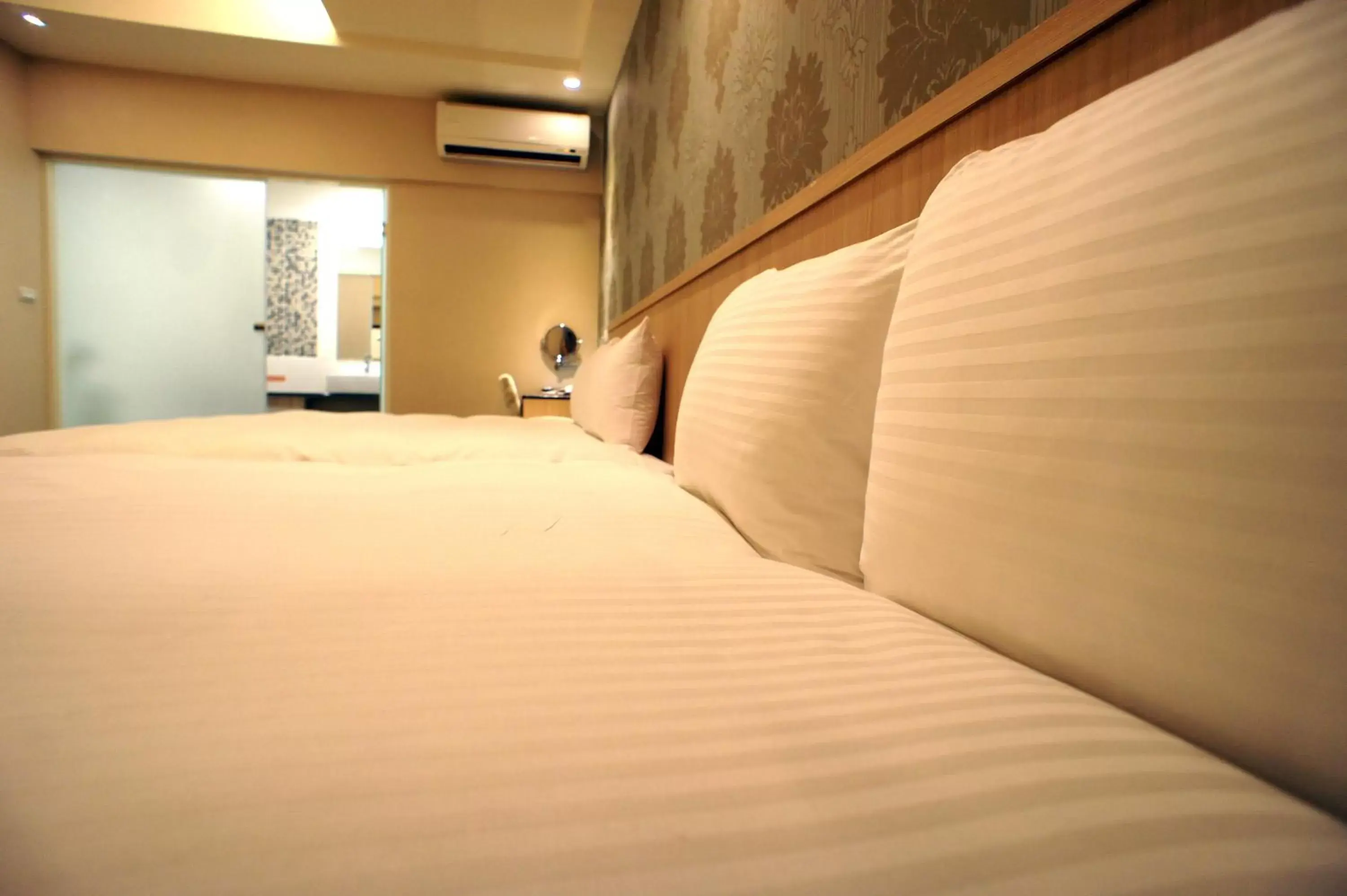 Bed in Fupin Hotel