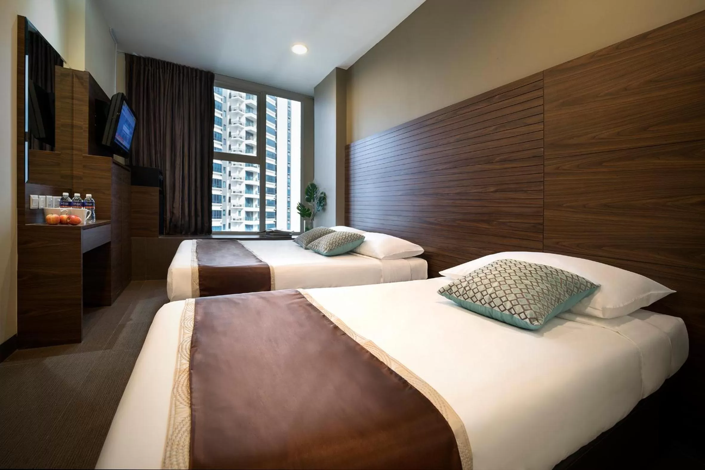 Bed in Value Hotel Thomson