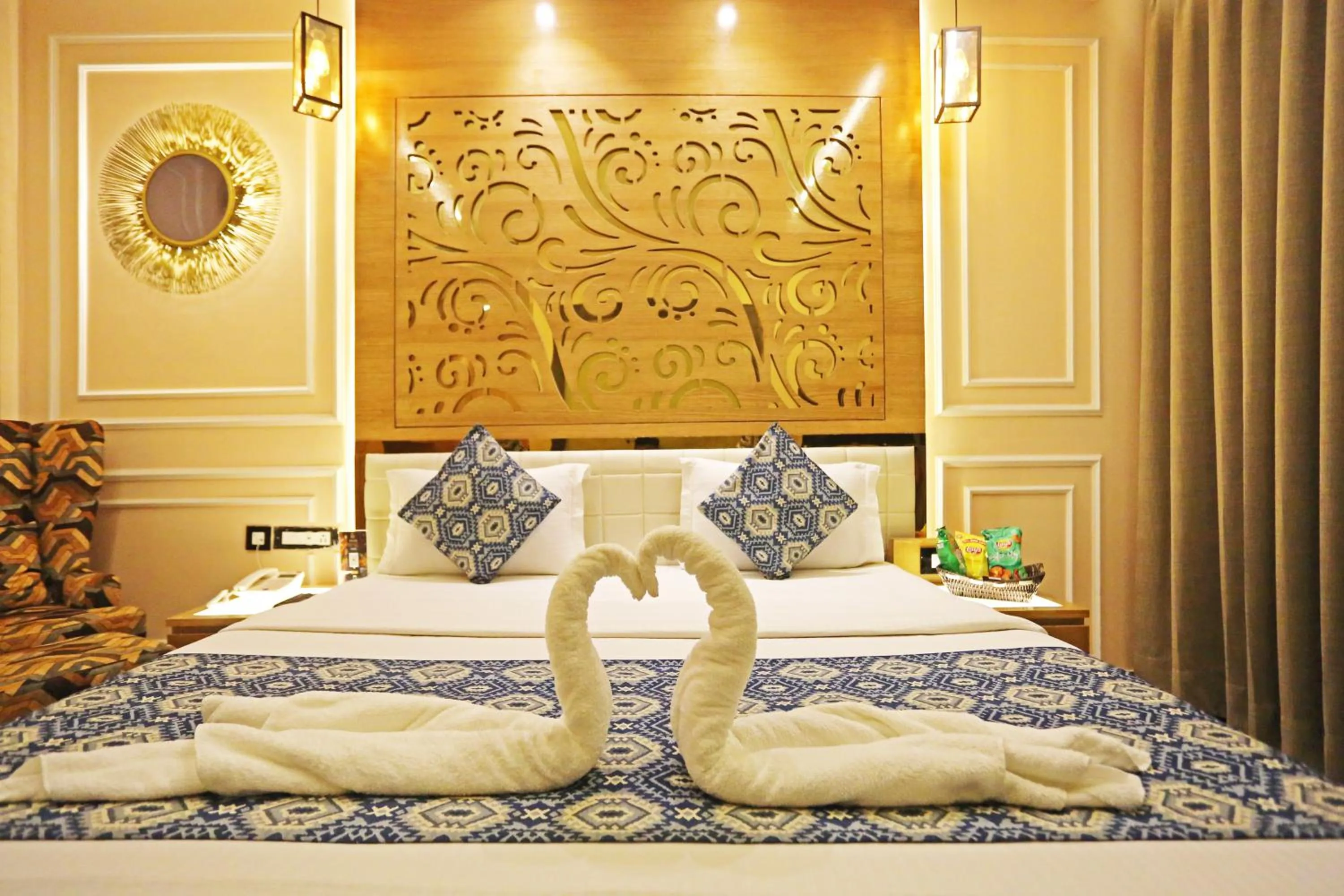Bed in JRD Luxury-Business Hotel