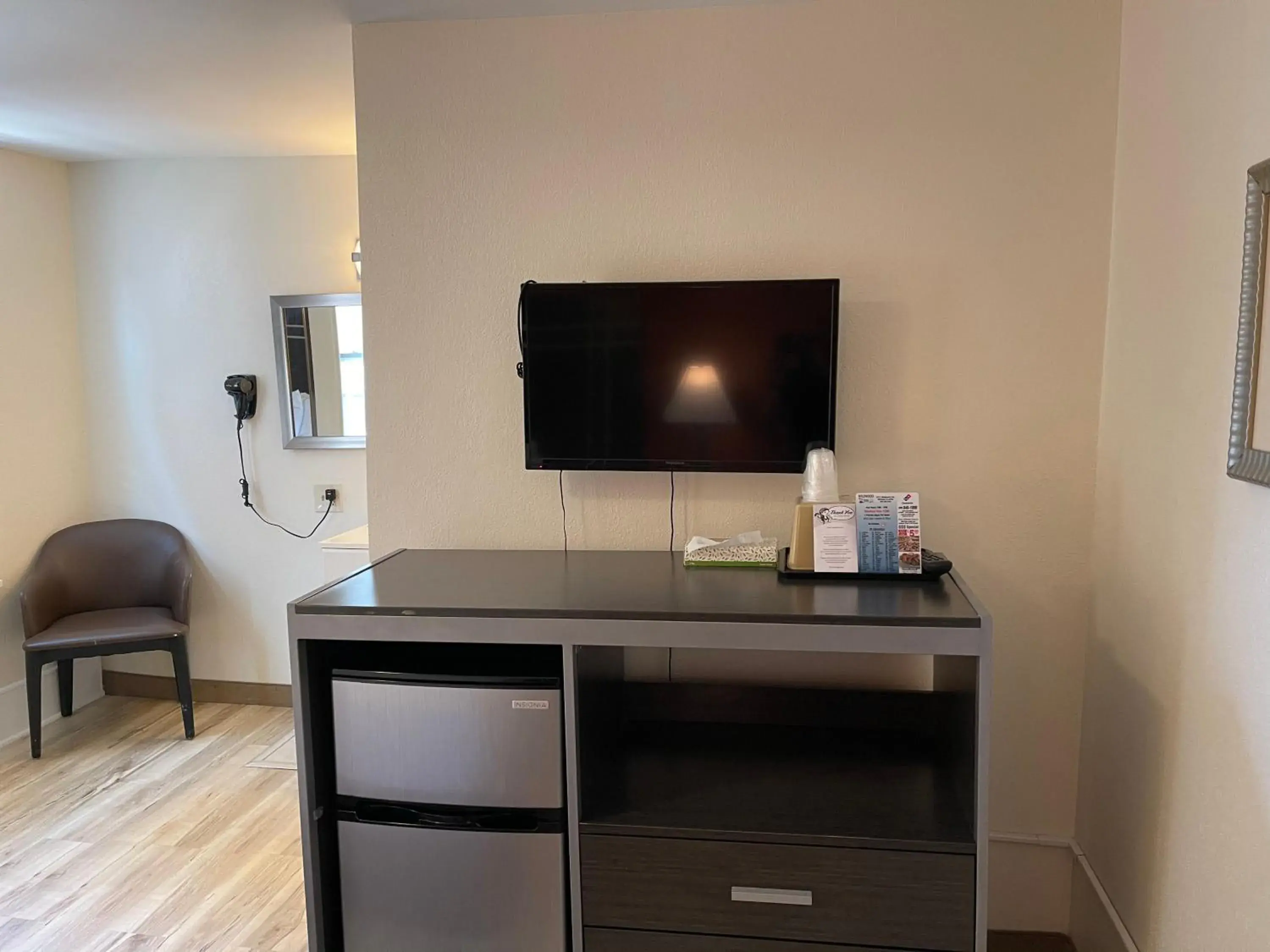 TV/Entertainment Center in Wildwood Inn, a Travelodge by Wyndham