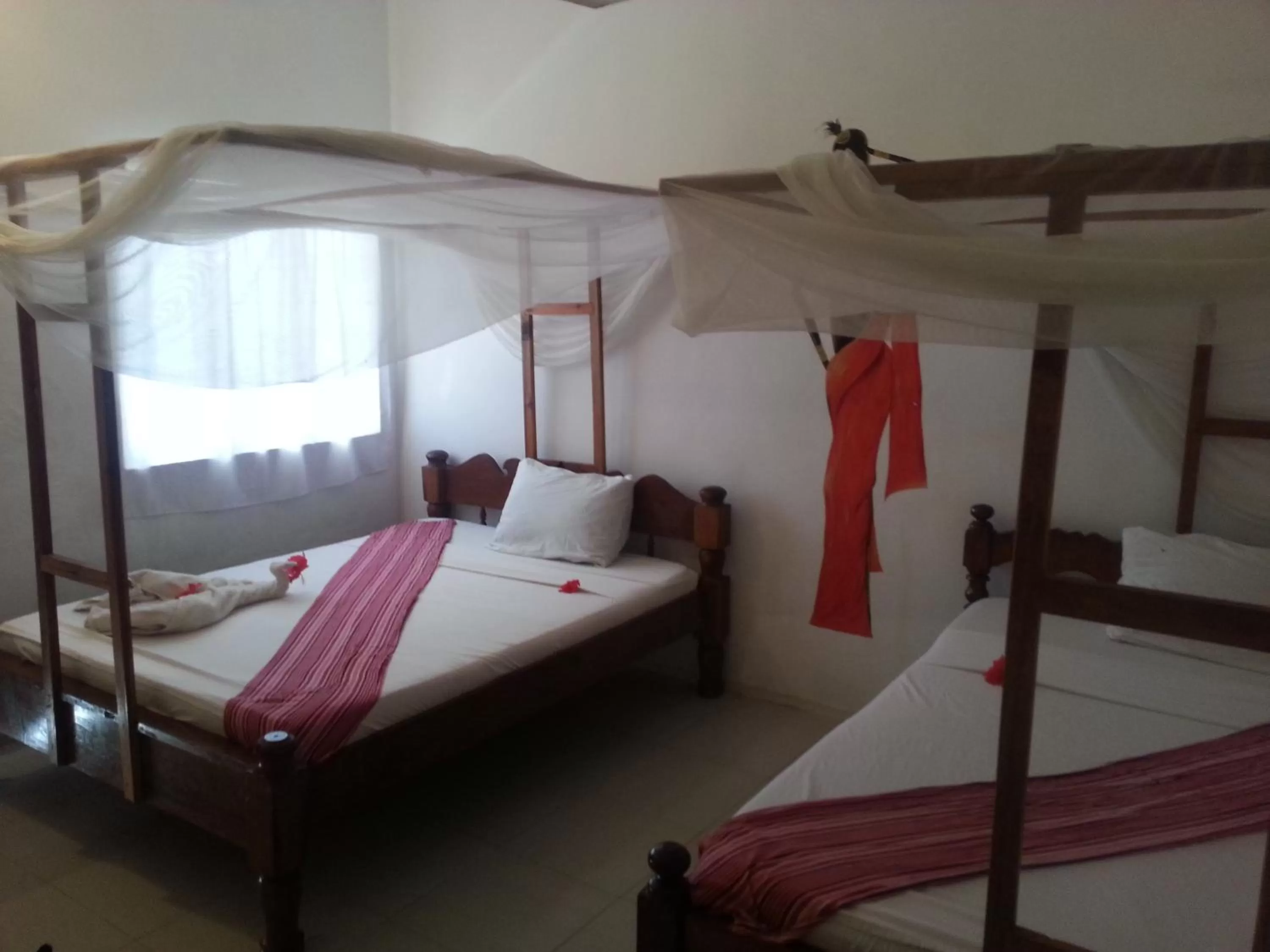 Bedroom in Ebony & Ivory Beach Bungalows