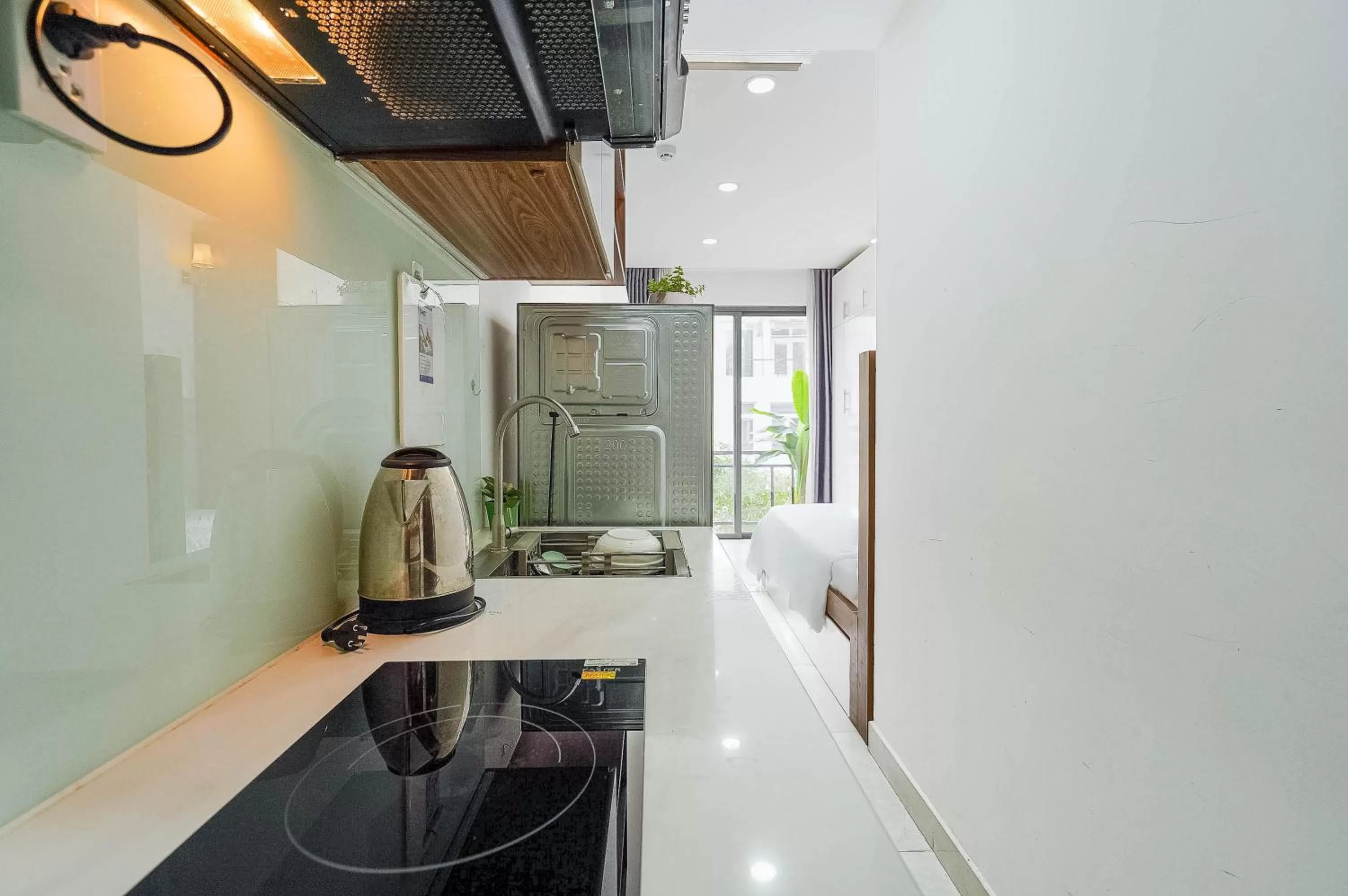 Kitchen or kitchenette in Spring Hill Apartment -The High Class