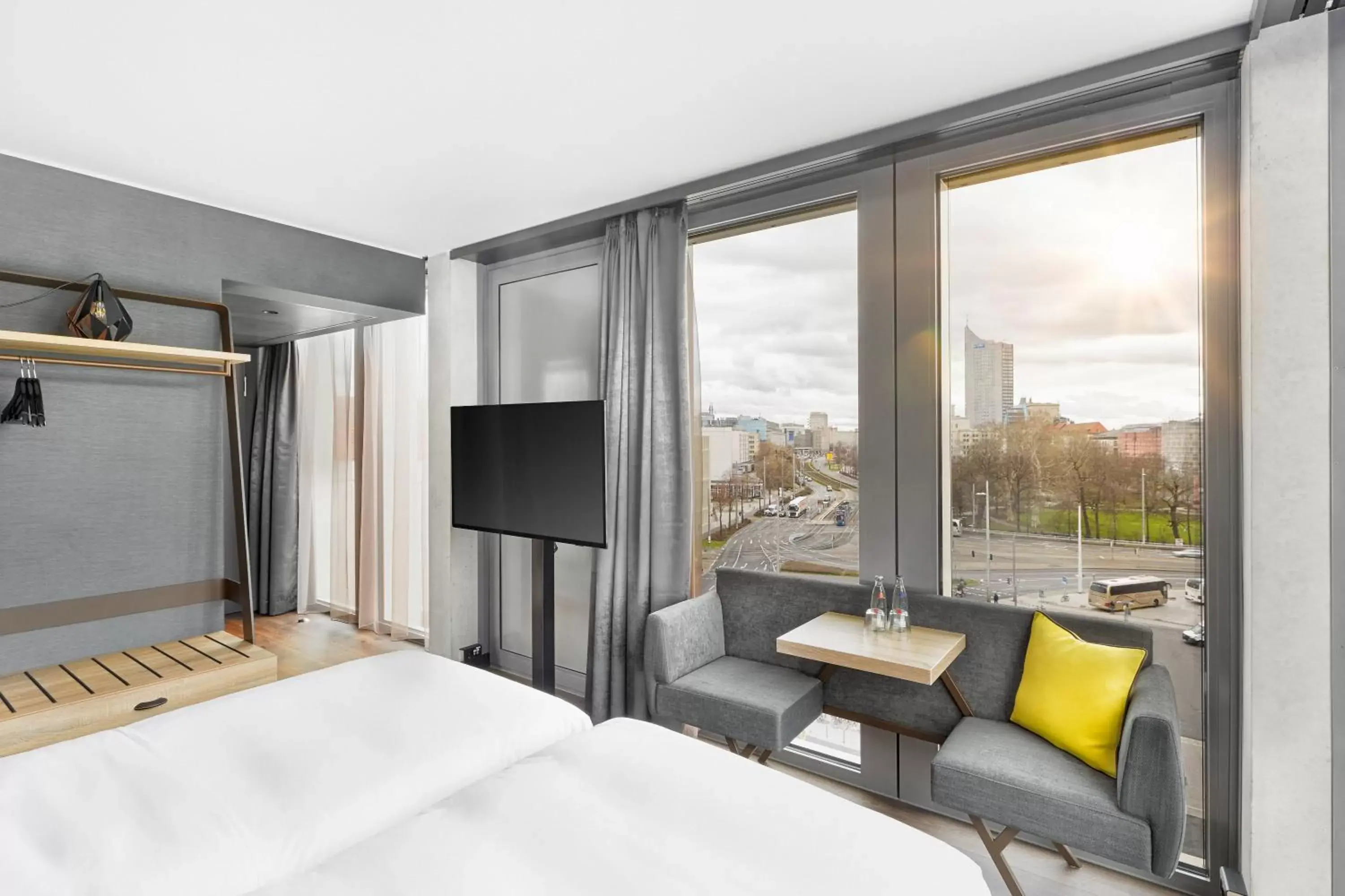 Seating area, Bed in HYPERION Hotel Leipzig Seating area, Bed in HYPERION Hotel Leipzig