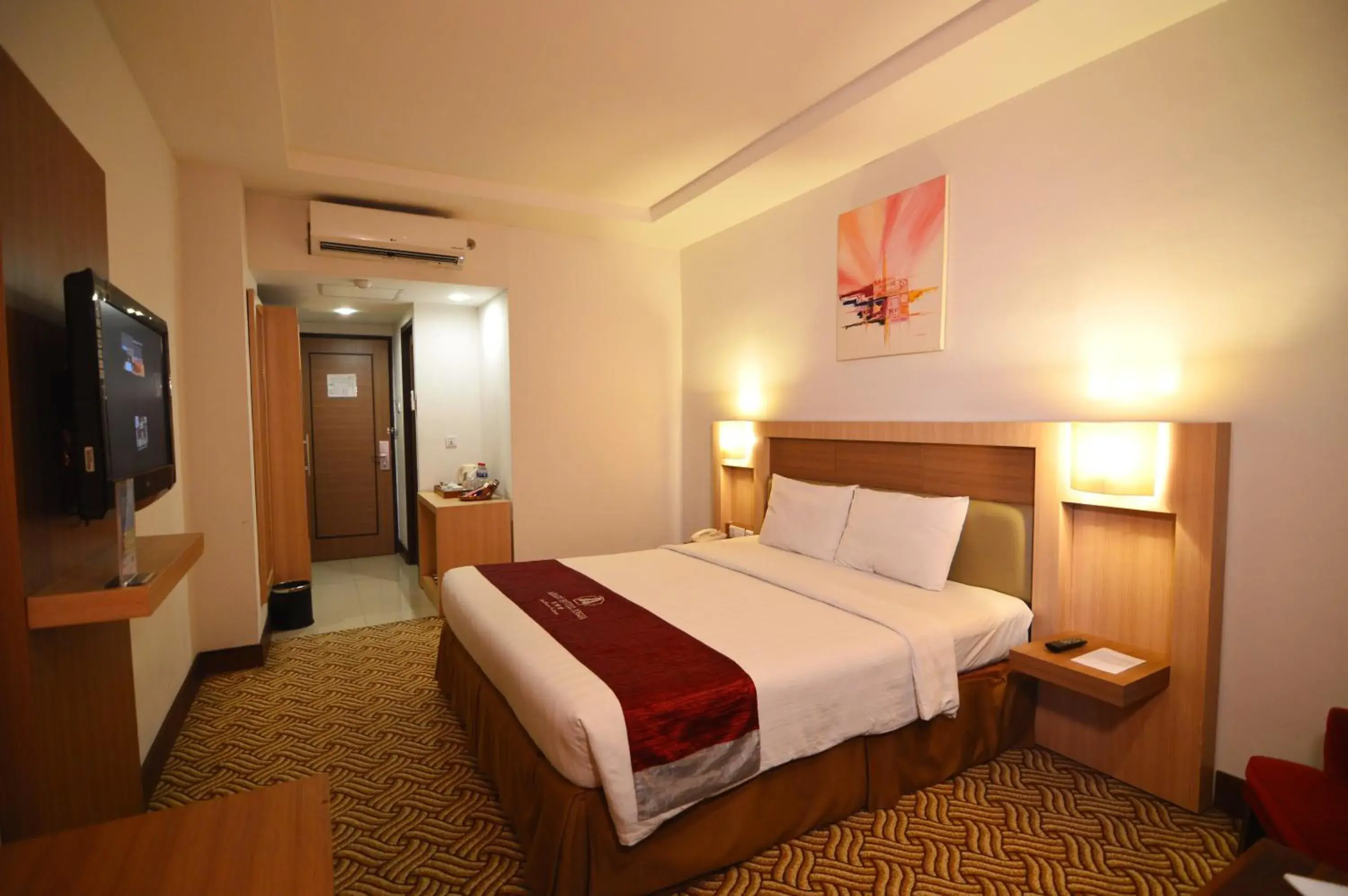 Photo of the whole room, Bed in Abadi Hotel Malioboro Yogyakarta by Tritama Hospitality
