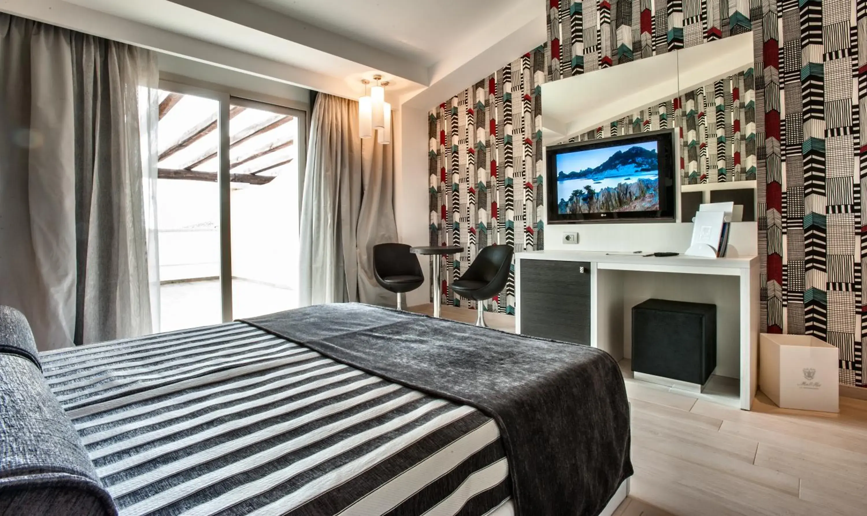 Bedroom, TV/Entertainment Center in Grand Hotel Ma&Ma Resort