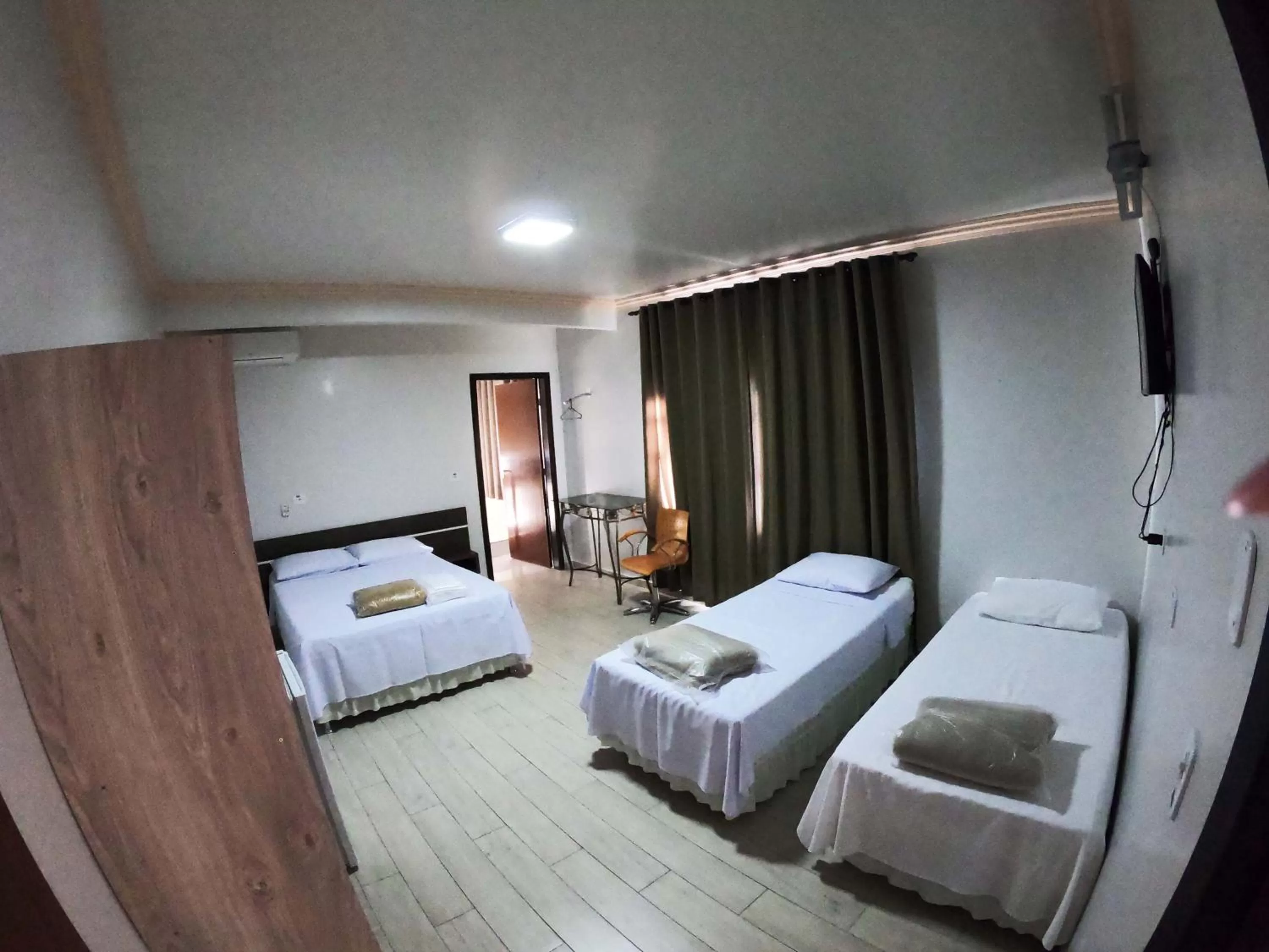 Bed in Hotel Paradizzo