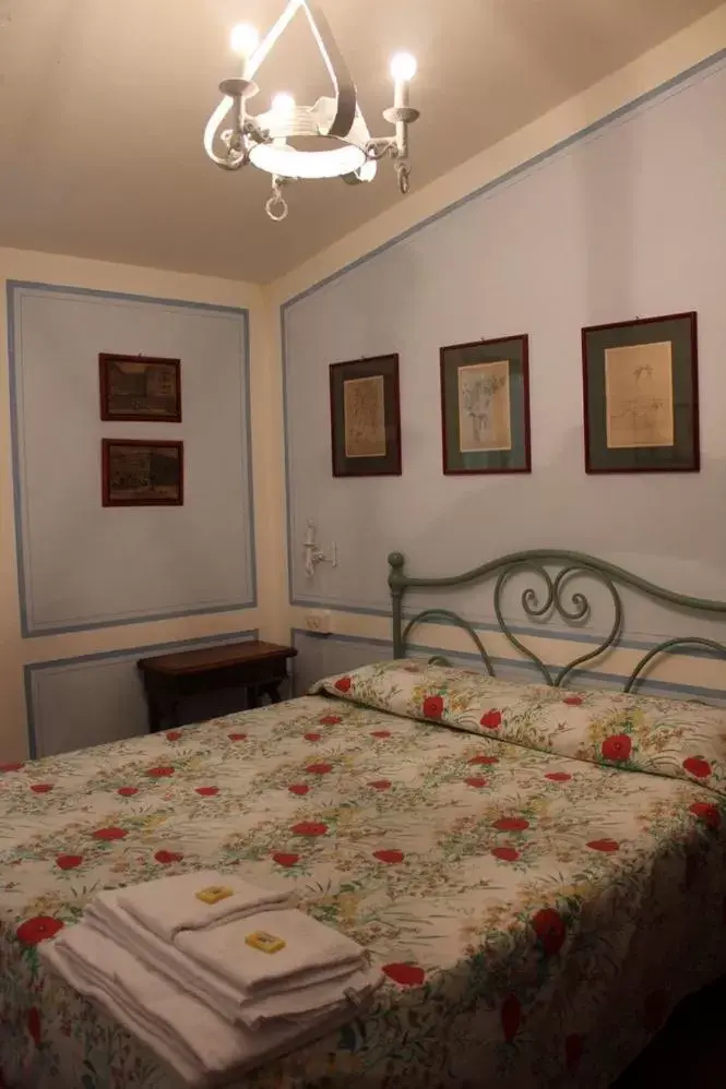 Photo of the whole room, Bed in Locanda Laudomia