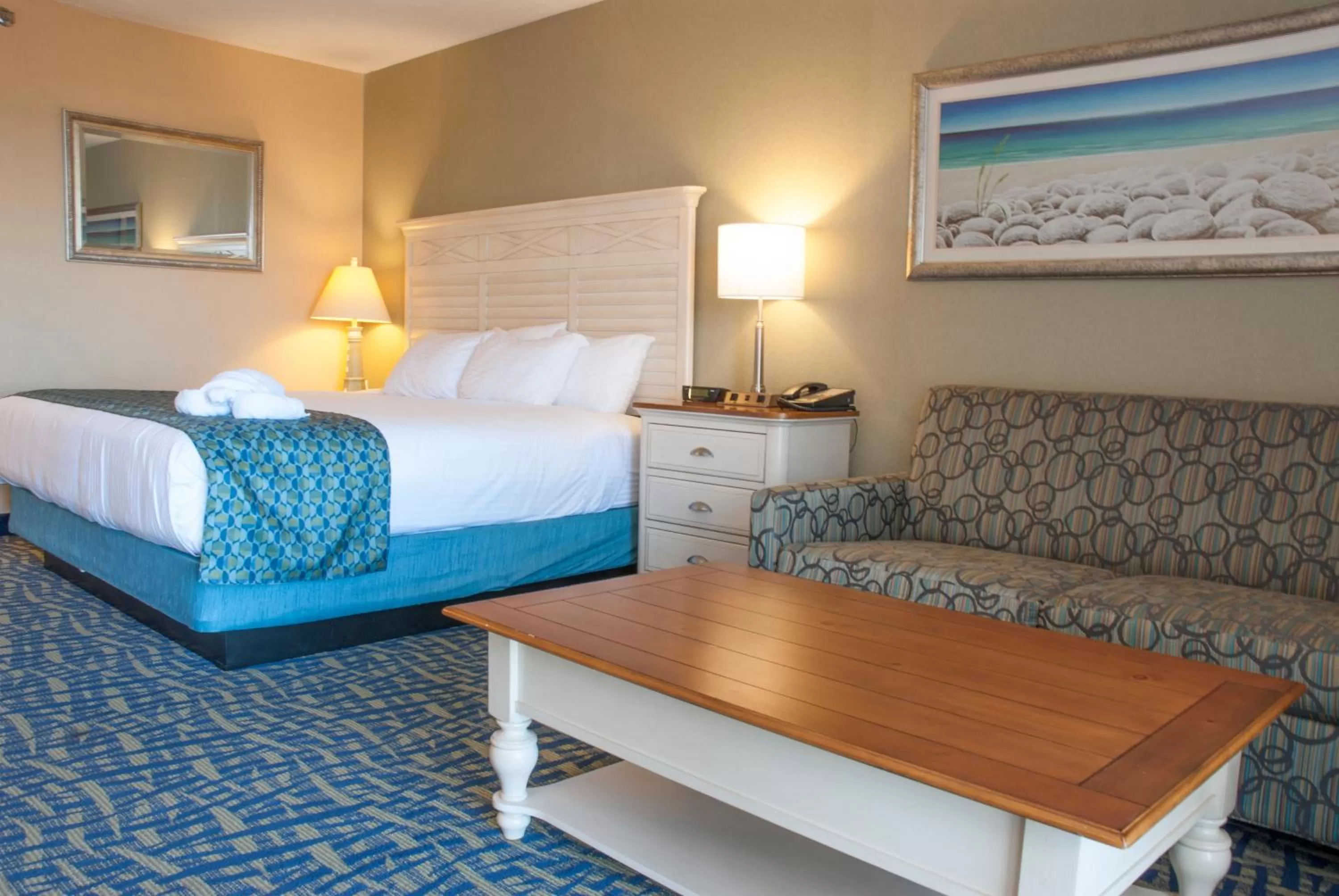 Seating area, Bed in Grand Beach Resort Hotel