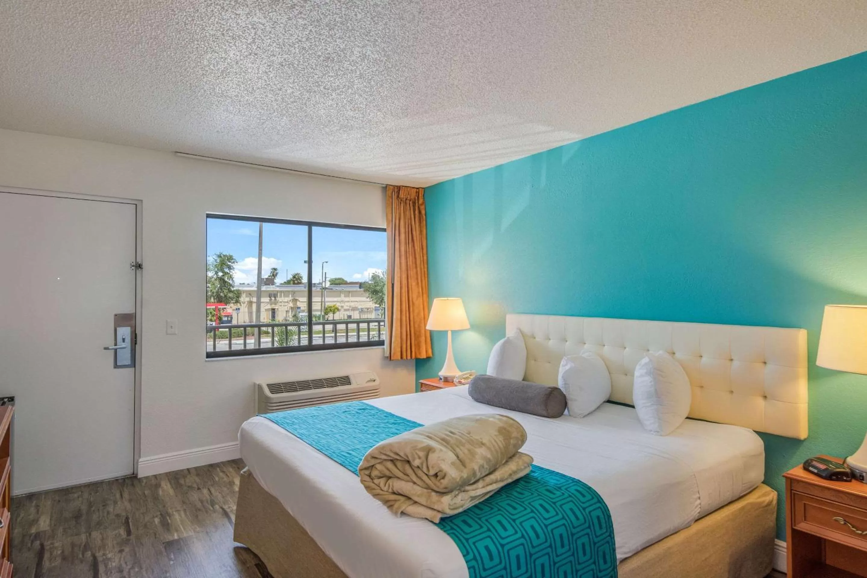 Photo of the whole room, Bed in Rodeway Inn Port Richey North