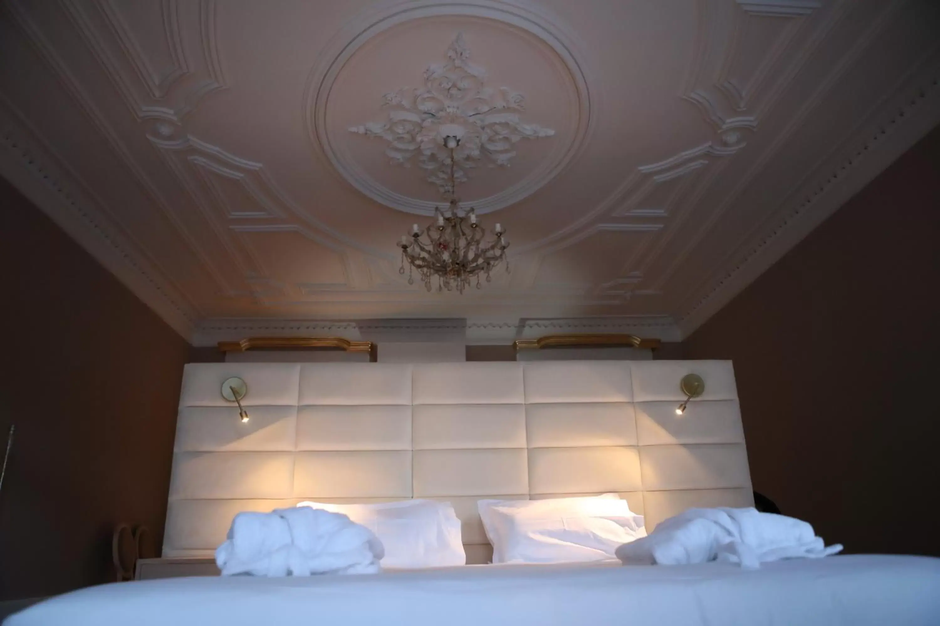 Bed in Muralha Charm House