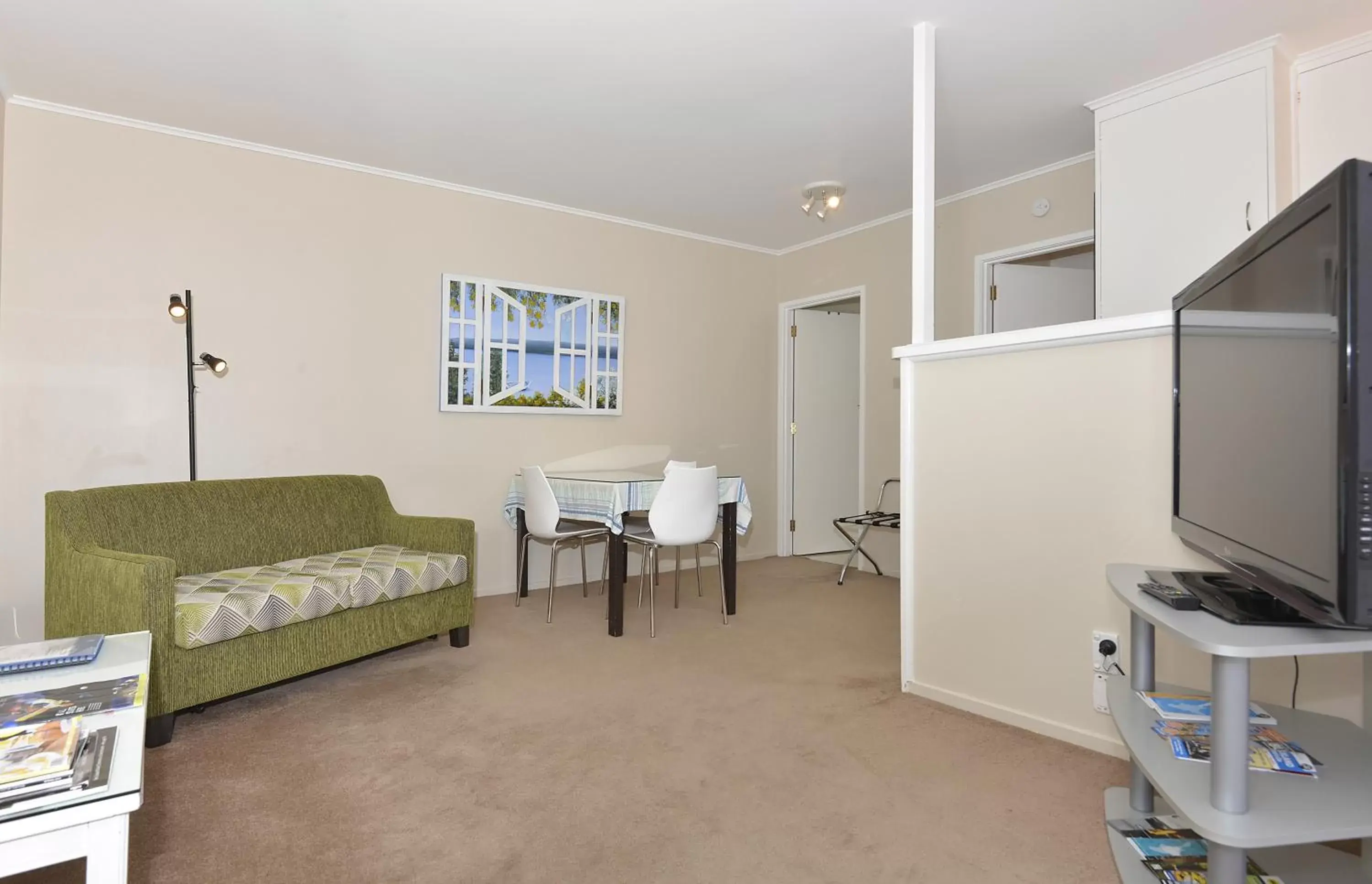 Living room, TV/Entertainment Center in Aarangi Motel