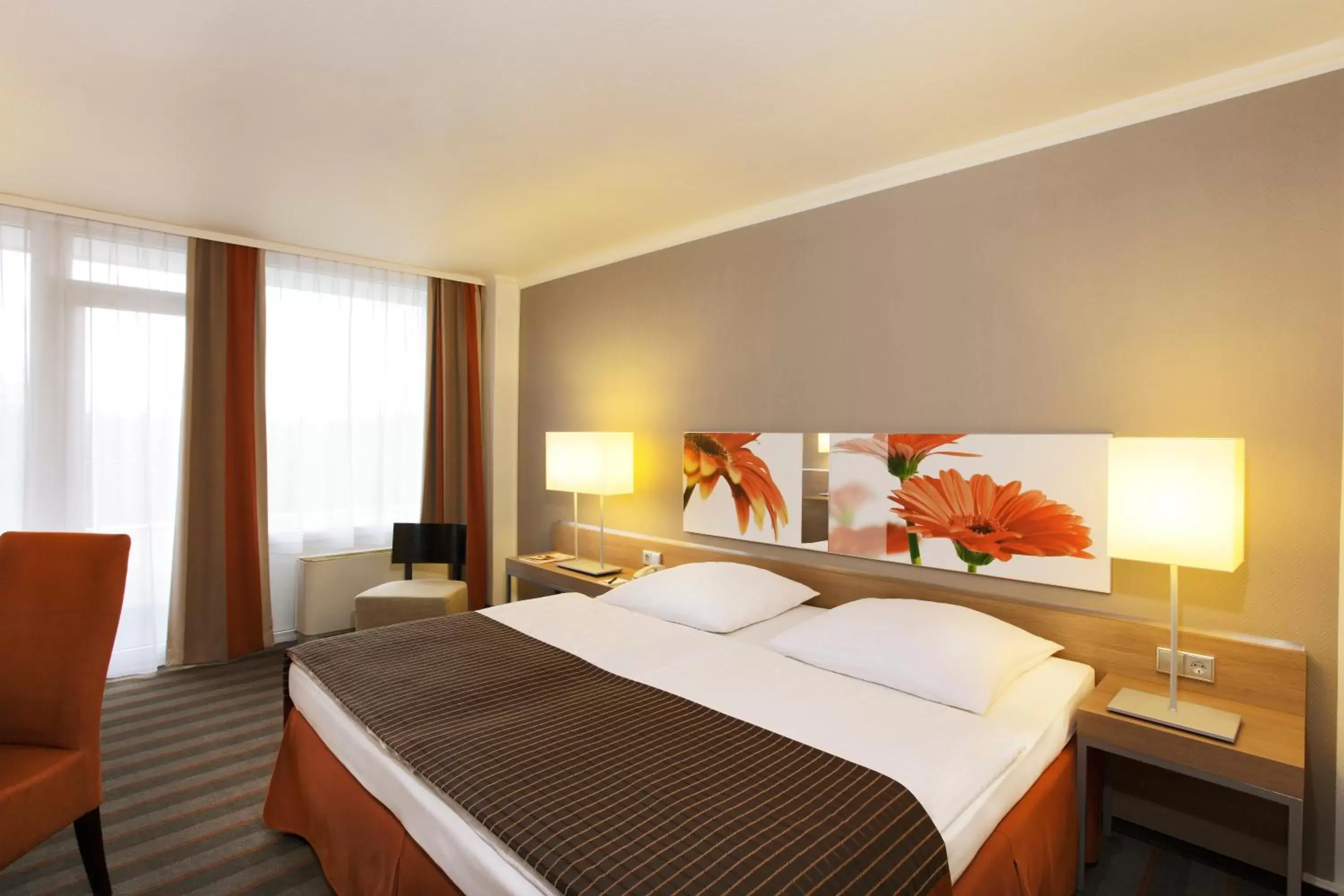 Bedroom, Bed in H4 Hotel Frankfurt Messe
