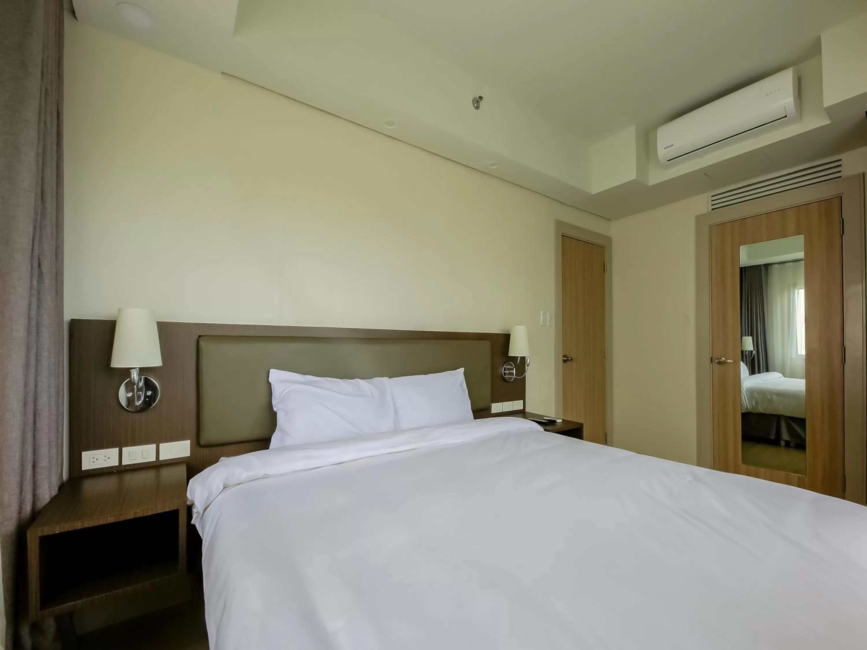 Bedroom, Bed in Capital O 804 The Residences at Bonifacio Civic Center