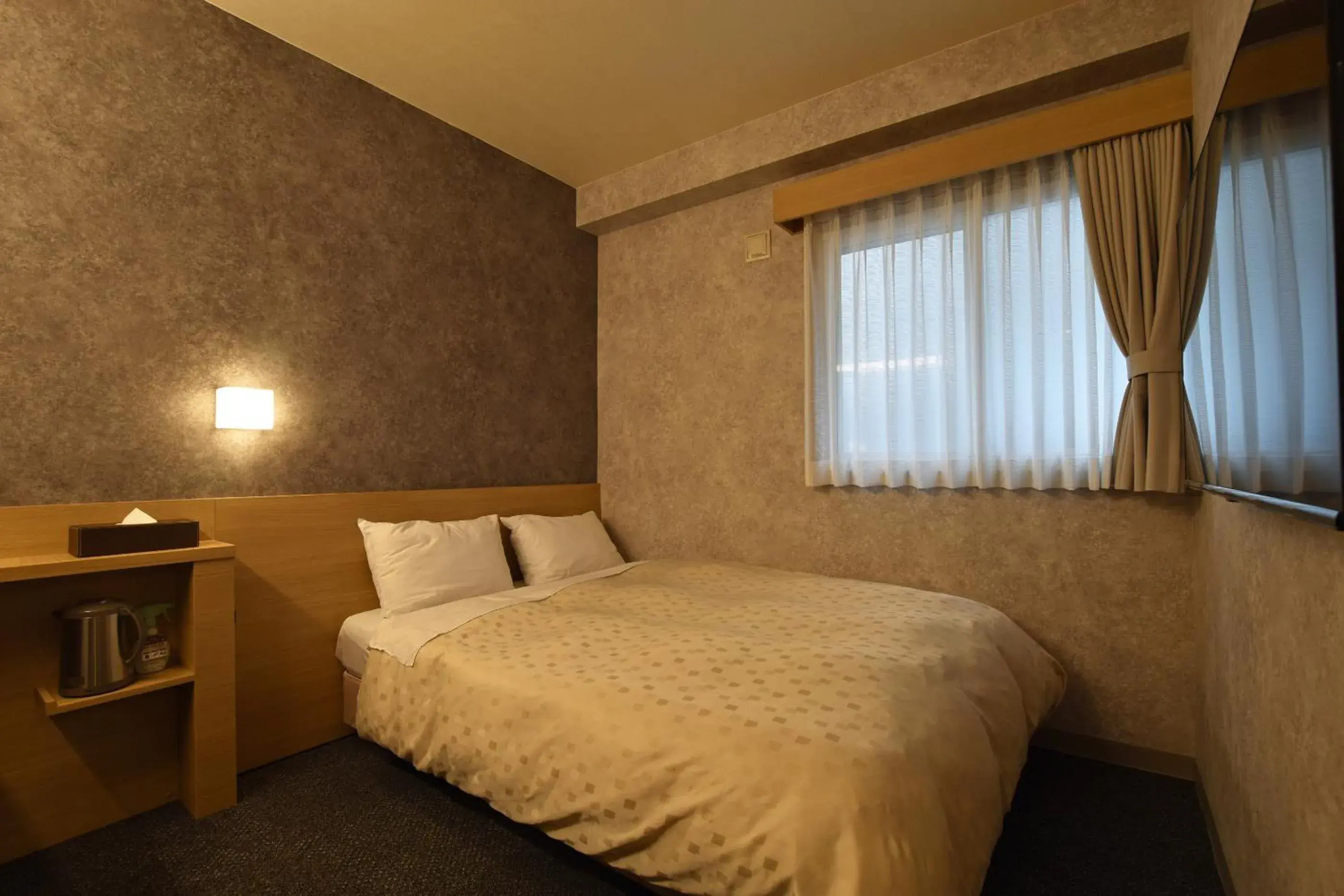 Photo of the whole room, Bed in Asahikawa Sun Hotel