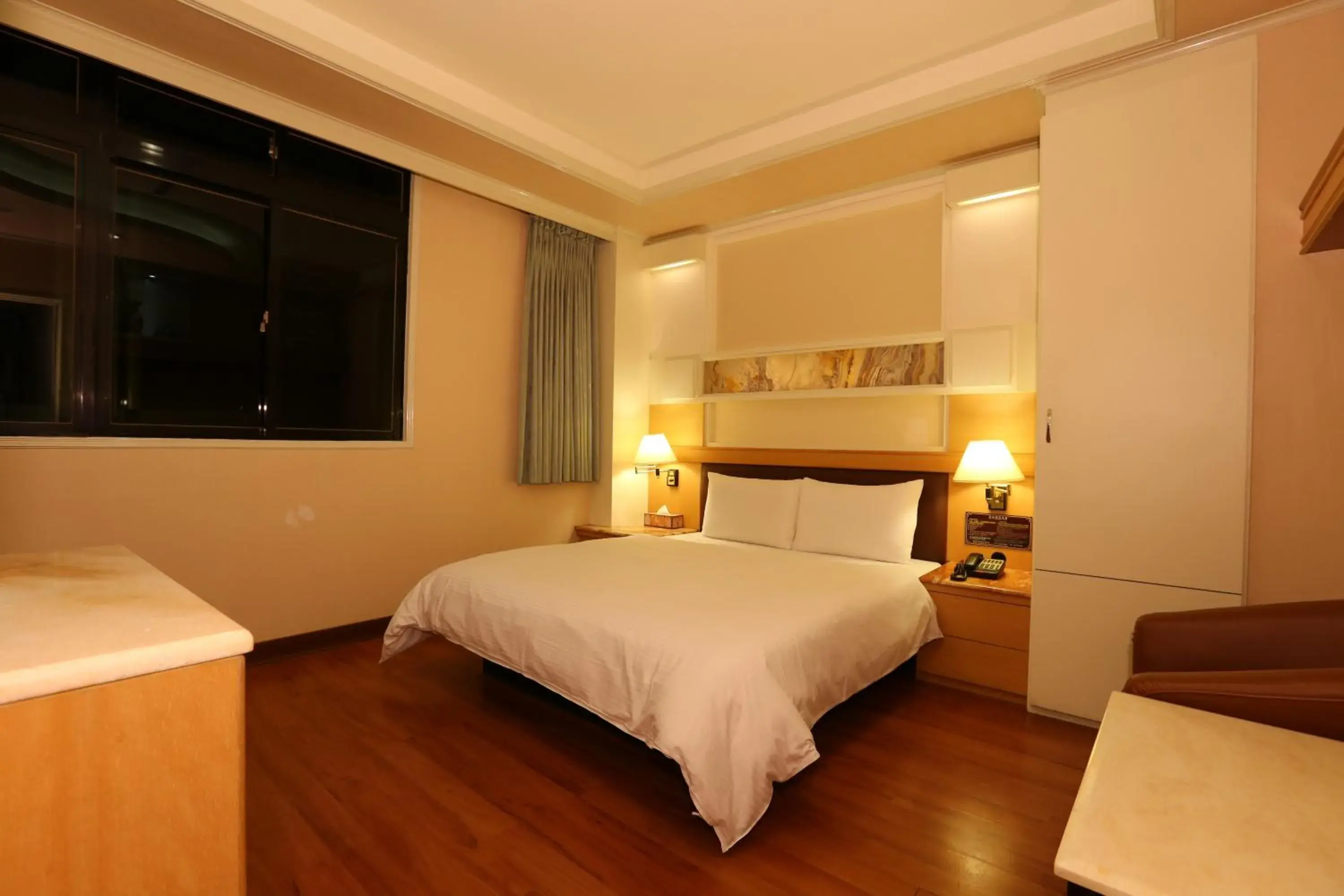 Bed in Kai Fu Hotel