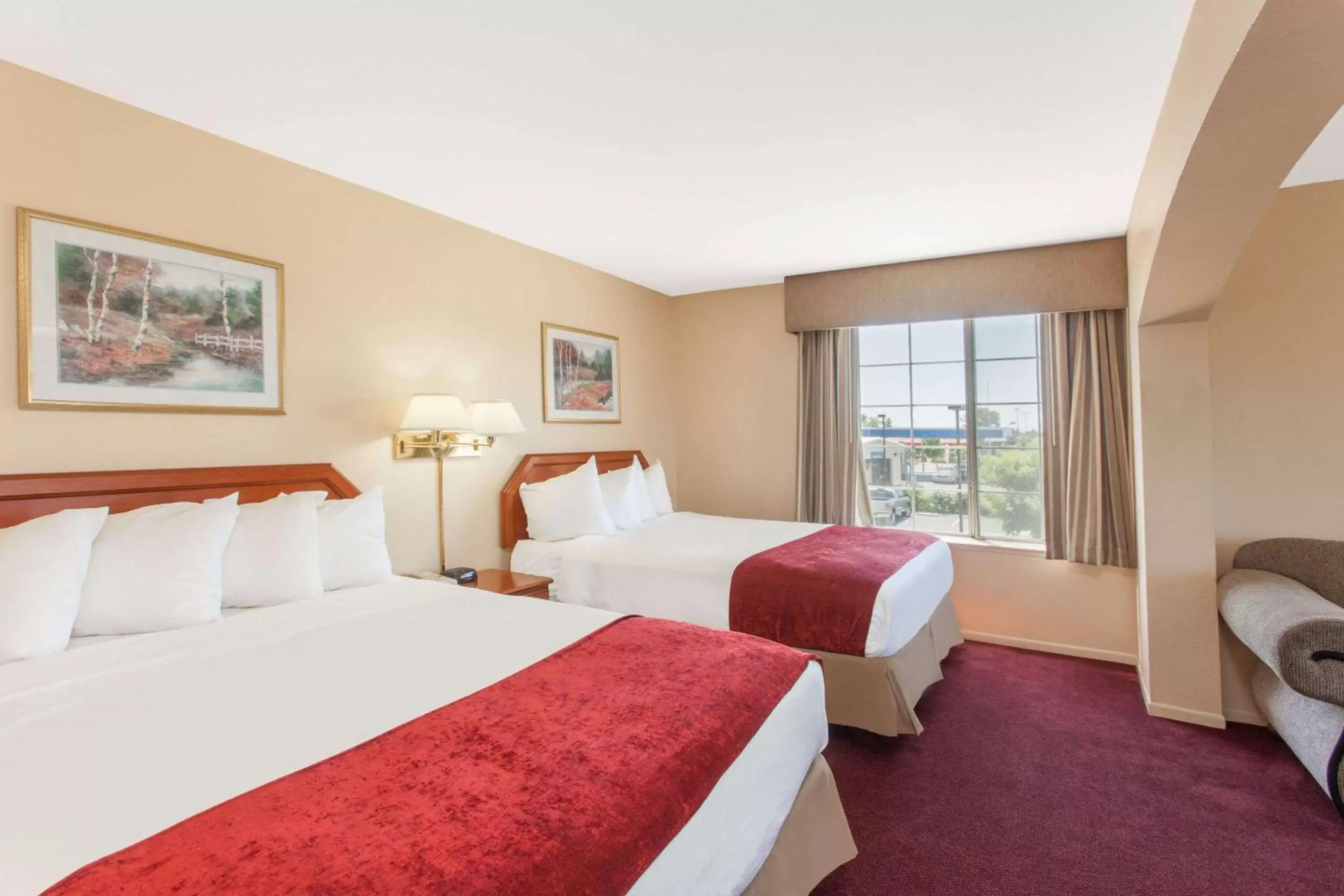Photo of the whole room, Bed in Ramada by Wyndham Fresno Northwest