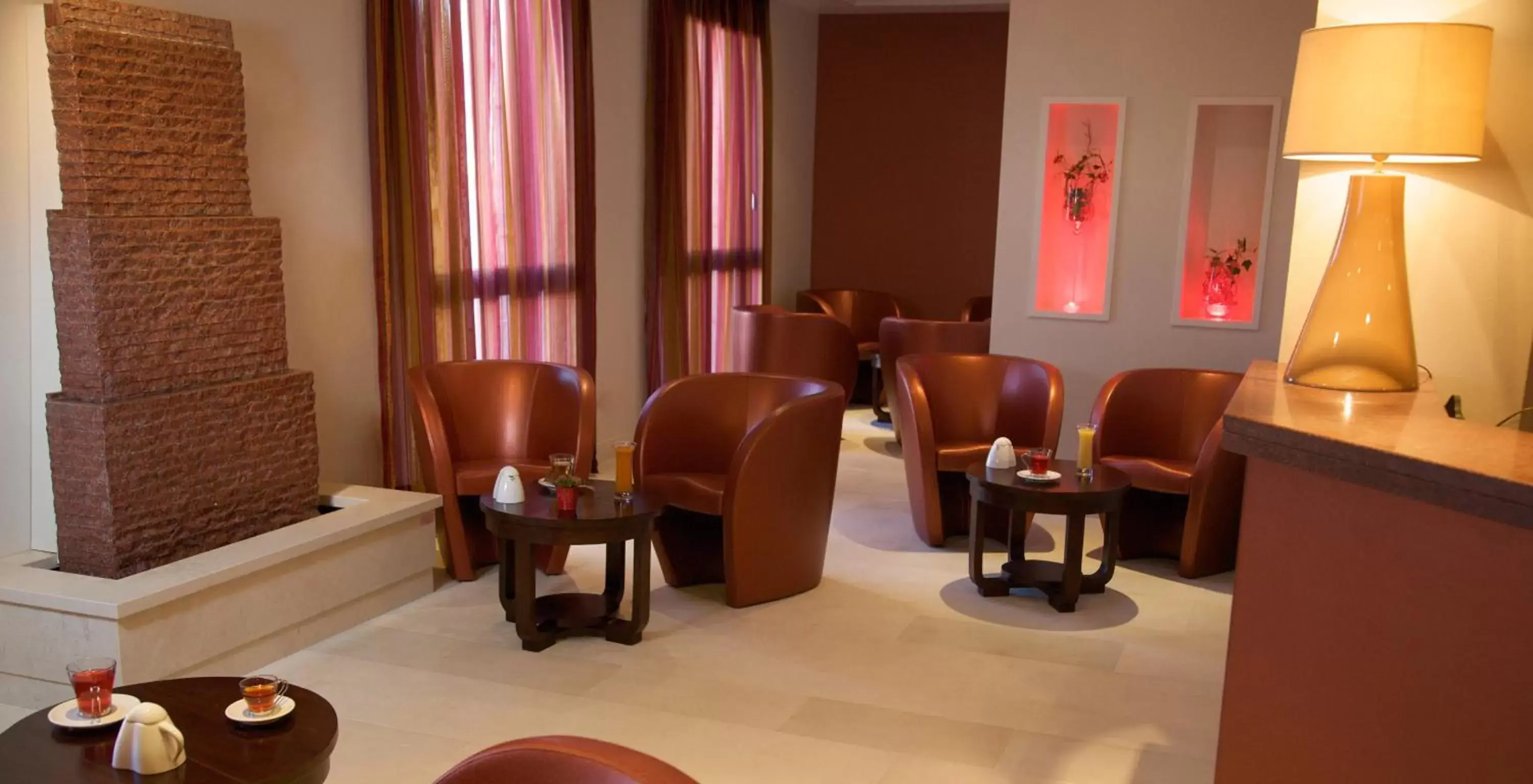 Lounge or bar in Hôtel Spa Du Béryl Lounge or bar in Hôtel Spa Du Béryl