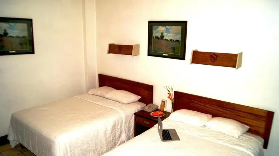 Photo of the whole room, Bed in Hotel Premier Saltillo Coahuila