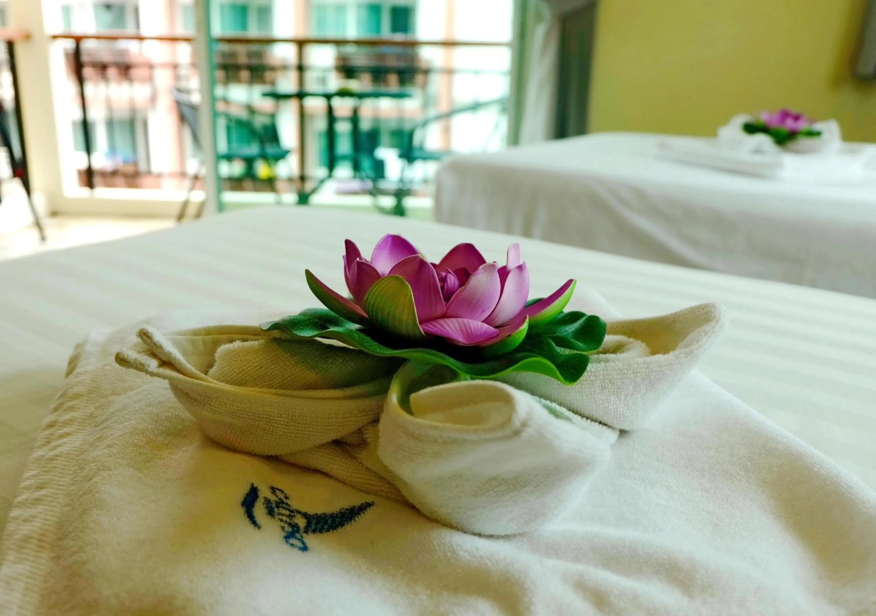 Bed in Calypso Patong Hotel