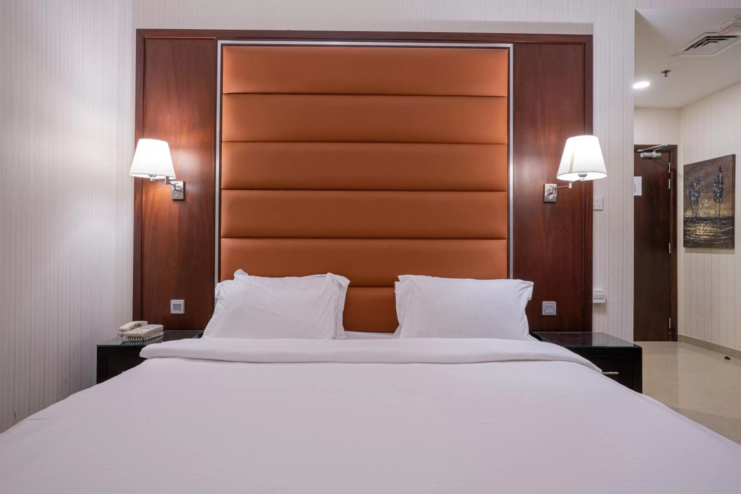 Bed in Vista City Hotel