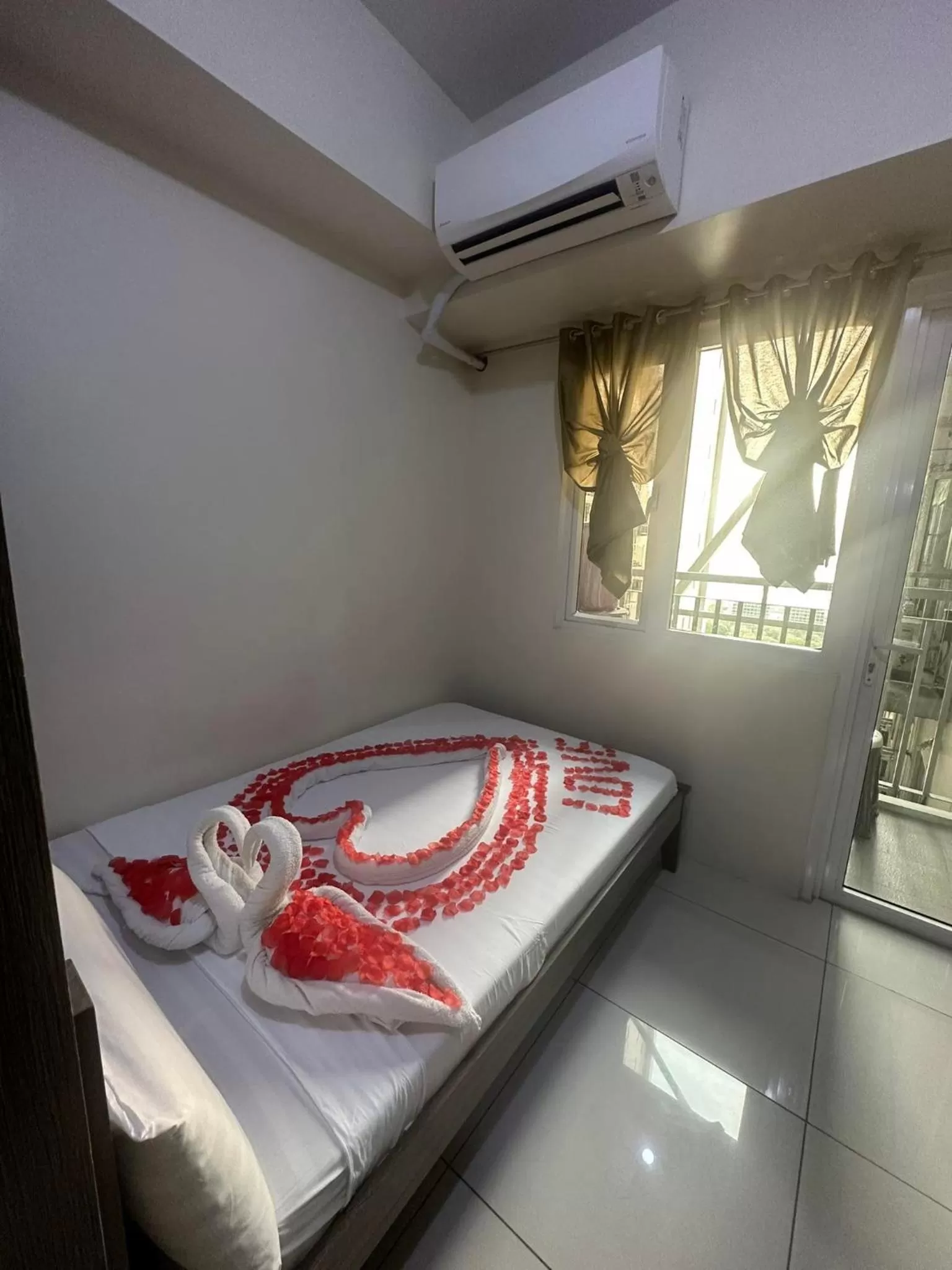 Bed in Green Residences Stays by PBYY