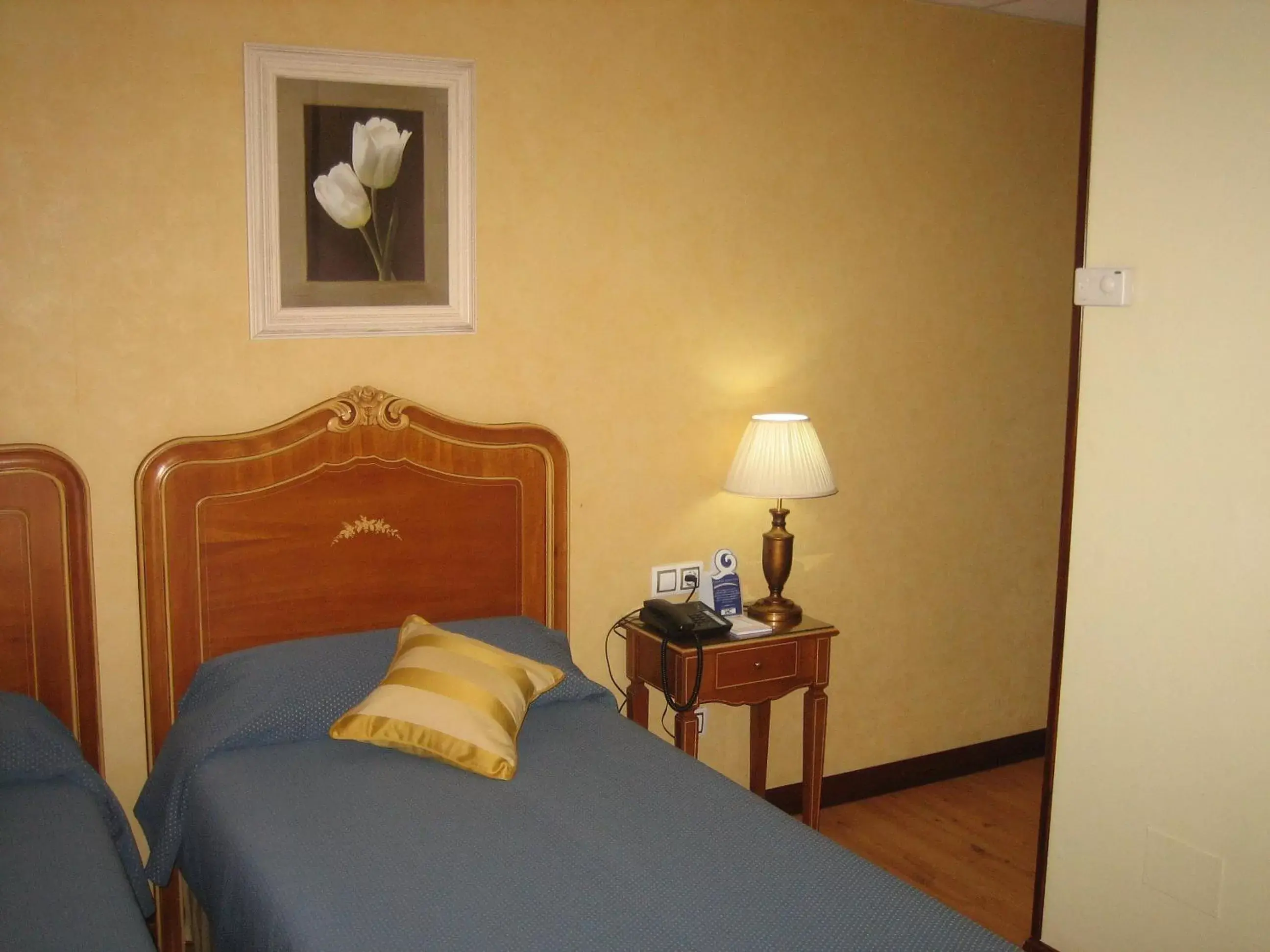 Bed in Hotel Santiago