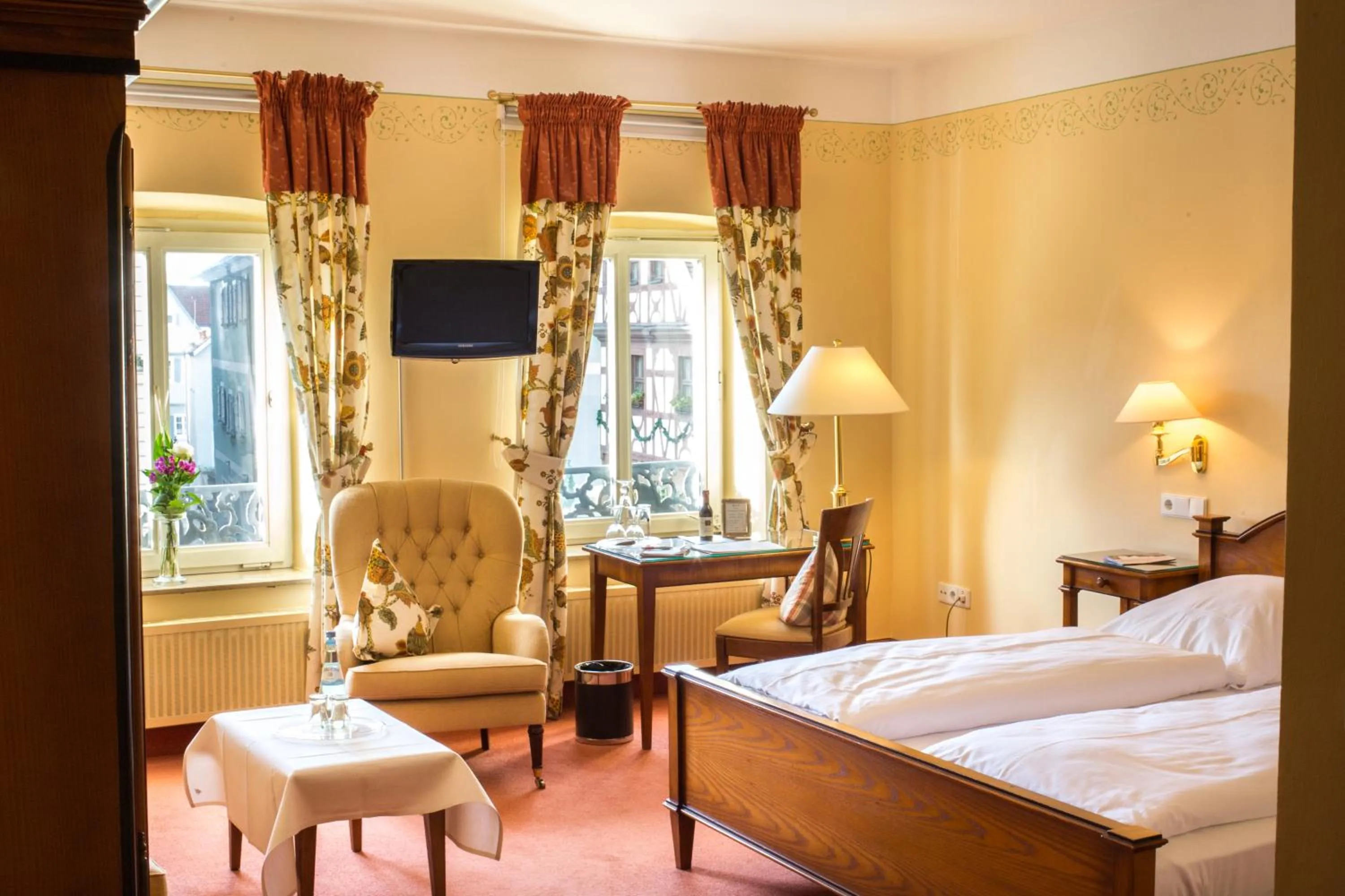 Photo of the whole room, Bed in WAGNERS Hotel Greifen-Post