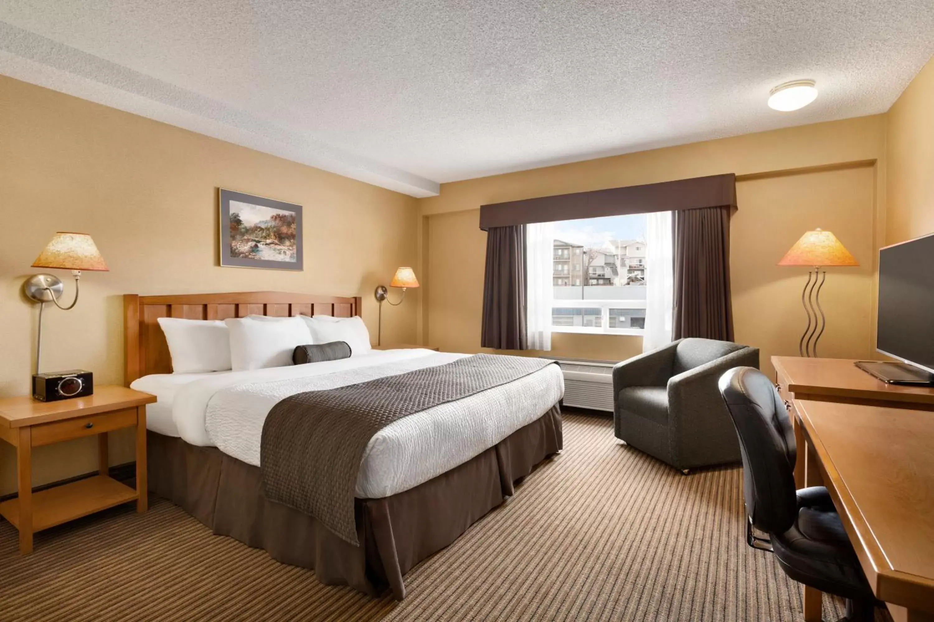 Photo of the whole room, Bed in Days Inn by Wyndham Calgary South