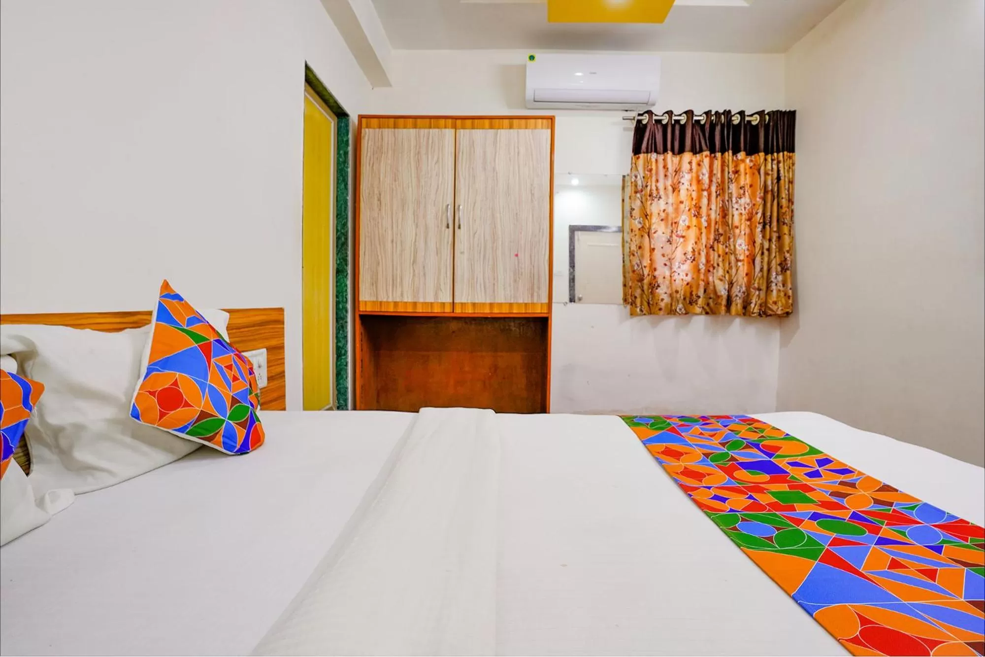 Bed in FabHotel Sai Chatra