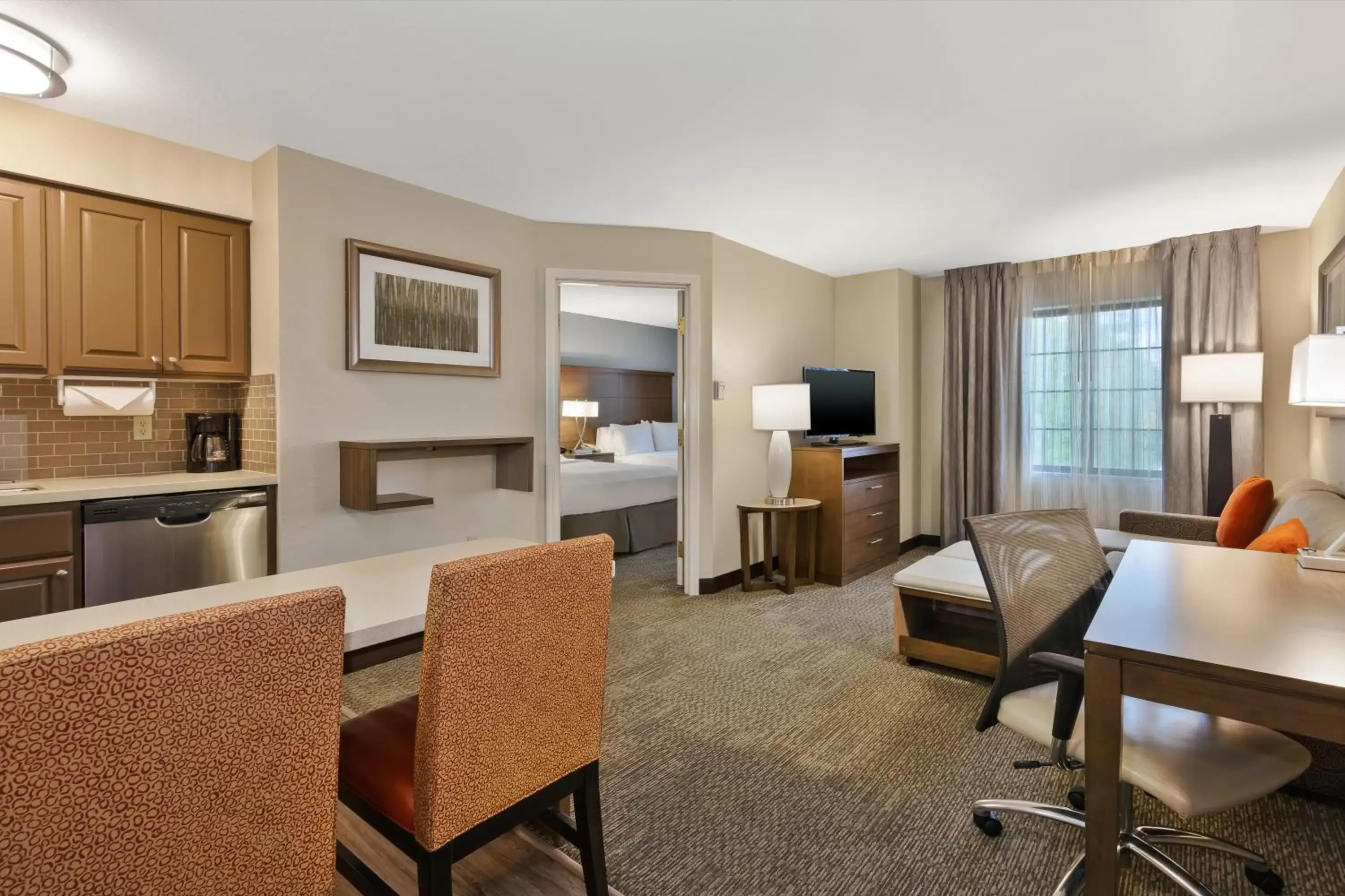 Photo of the whole room, Seating Area in Staybridge Suites Kalamazoo, an IHG Hotel
