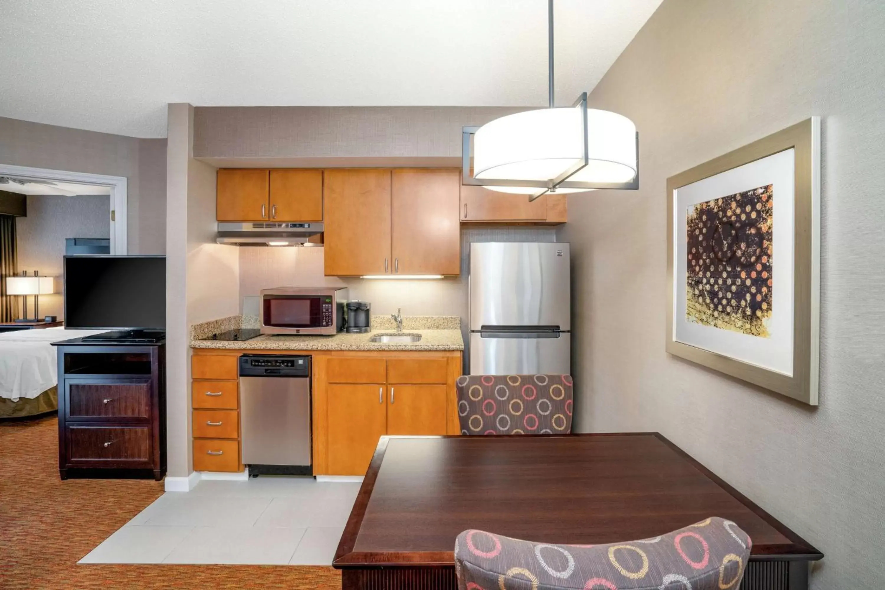 Bedroom, Kitchen/Kitchenette in Homewood Suites Lafayette
