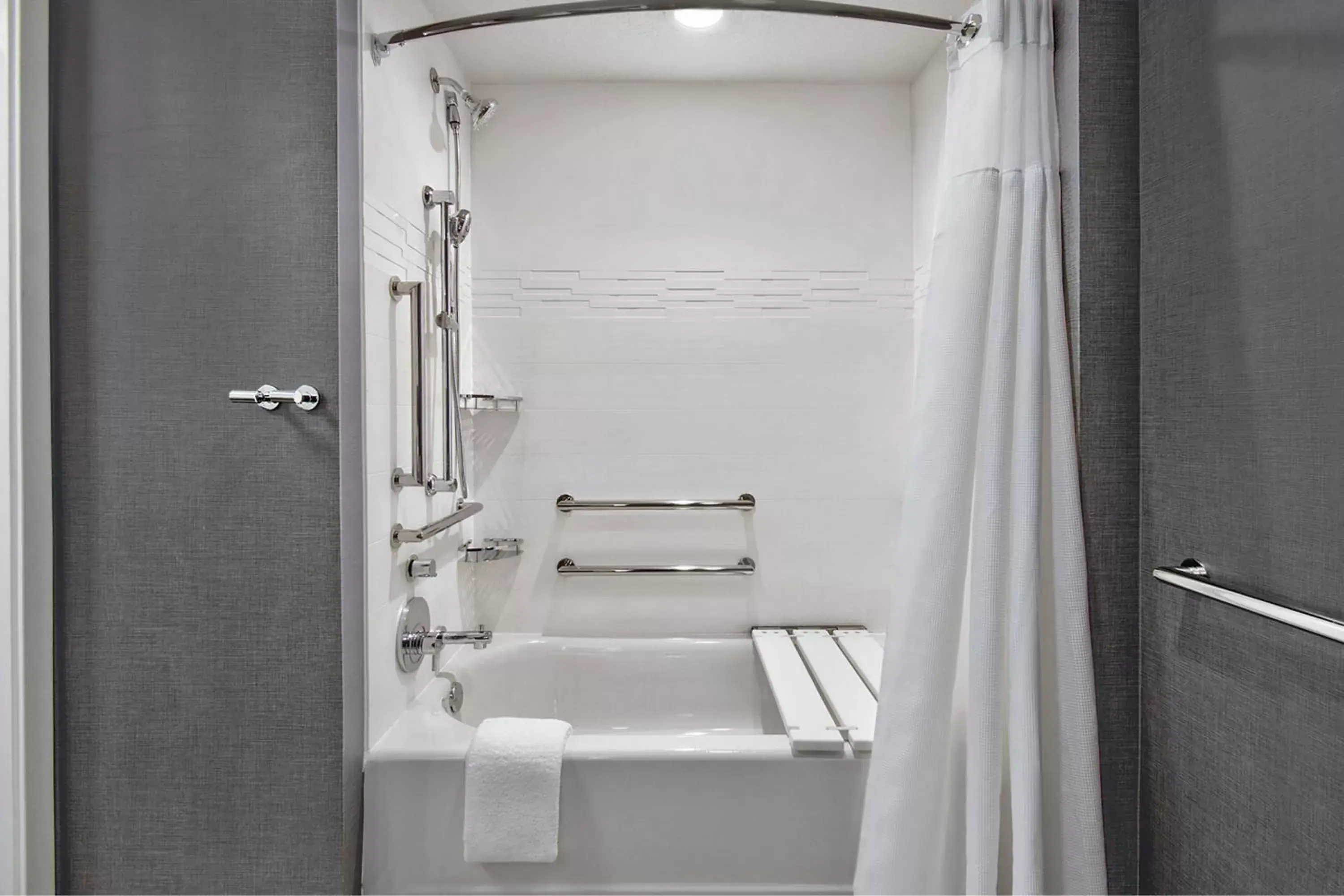 Bathroom in Residence Inn by Marriott Orlando at FLAMINGO CROSSINGS Town Center