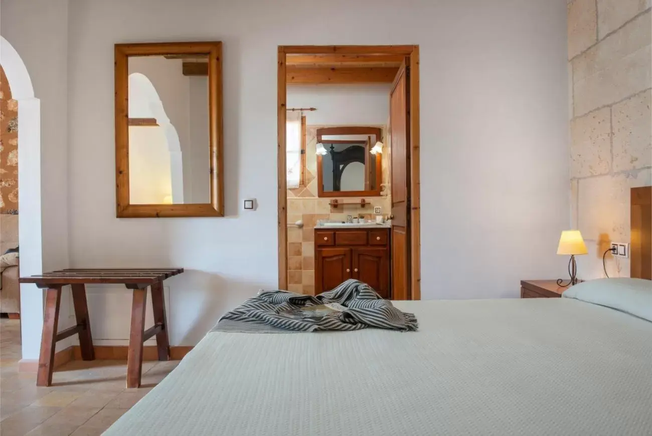 Bedroom, Bed in Finca Hotel Can Canals & Spa