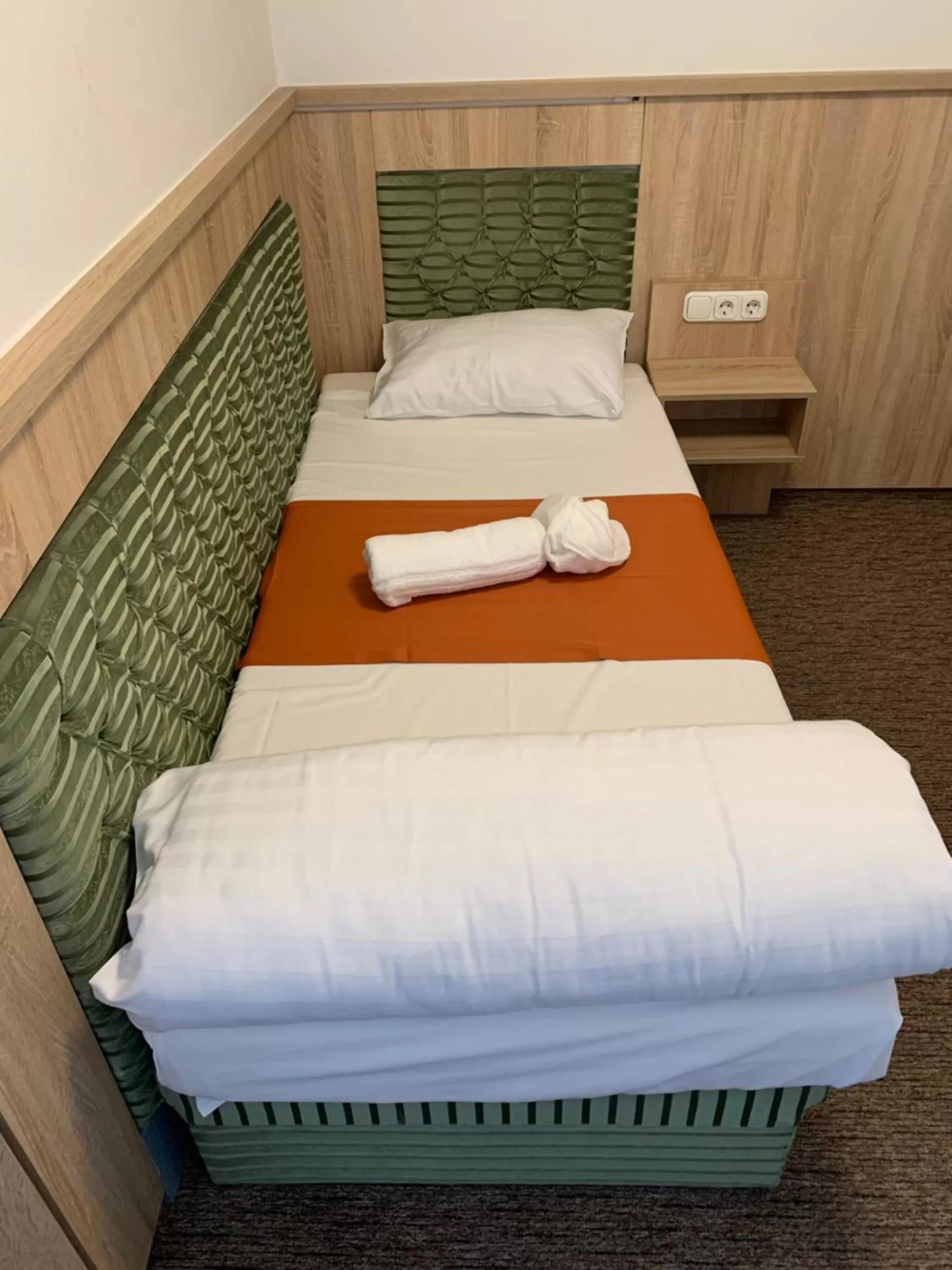 Bed in Várfal Wellness Panzió