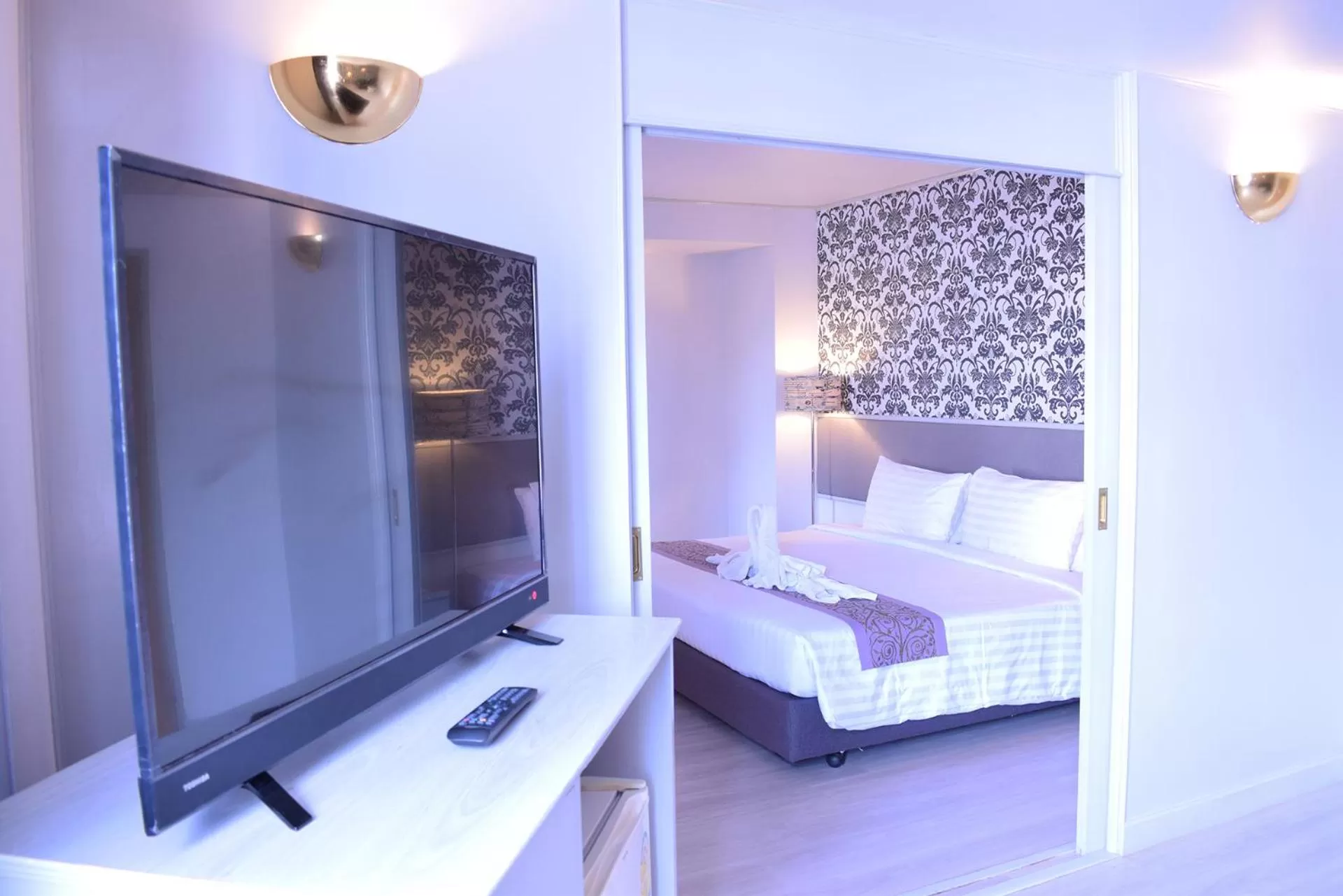 Bed in Trang Hotel Bangkok - SHA Plus