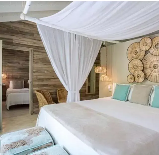 Bed in Mahona Boutique Hotel