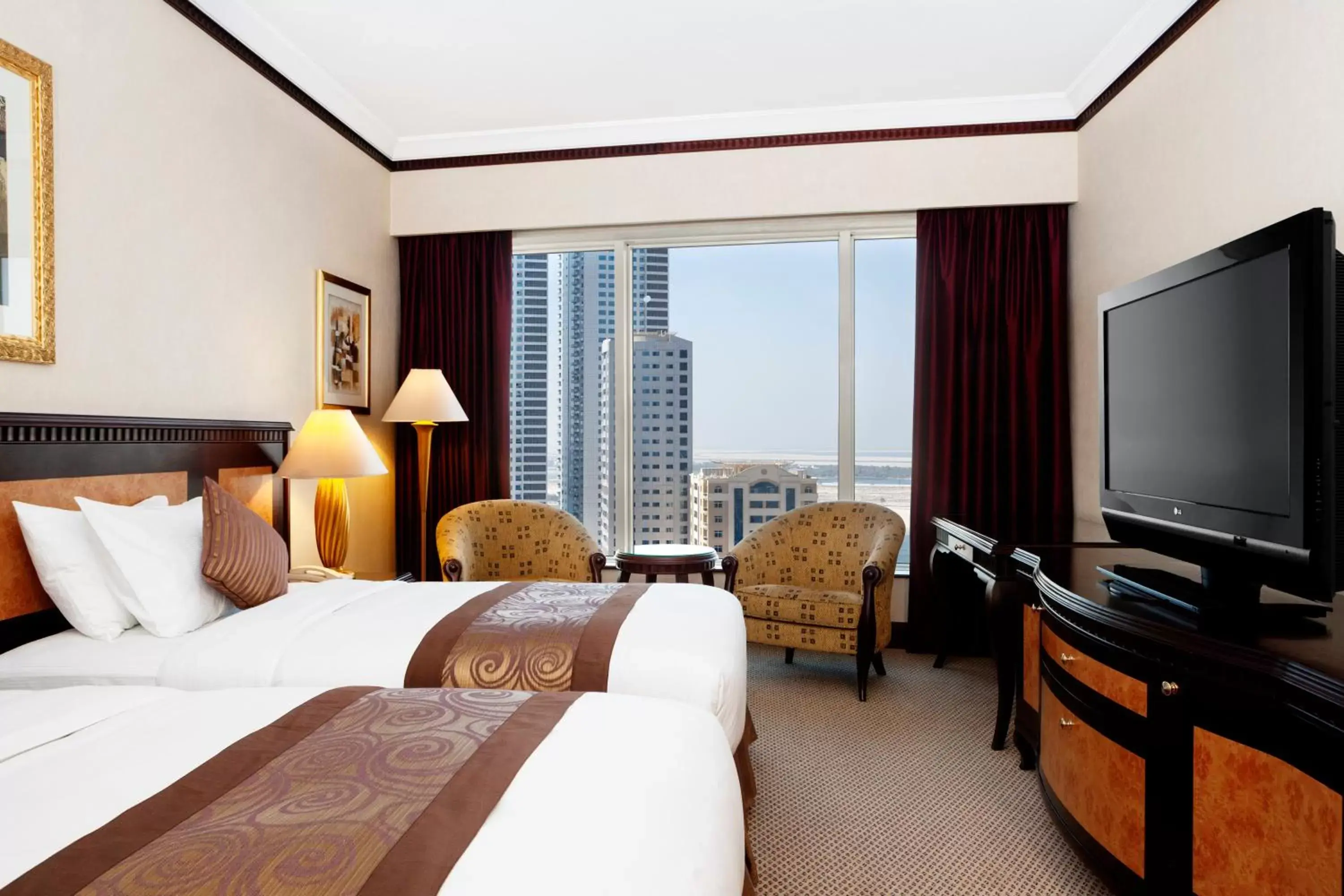 Bed in Corniche Hotel Sharjah