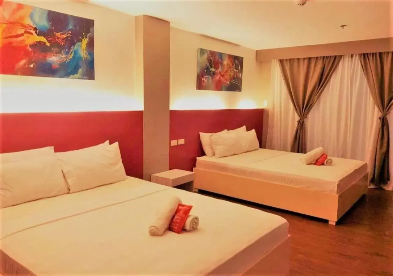 Family Room in RedDoorz Plus at Hotel Metro Kalibo