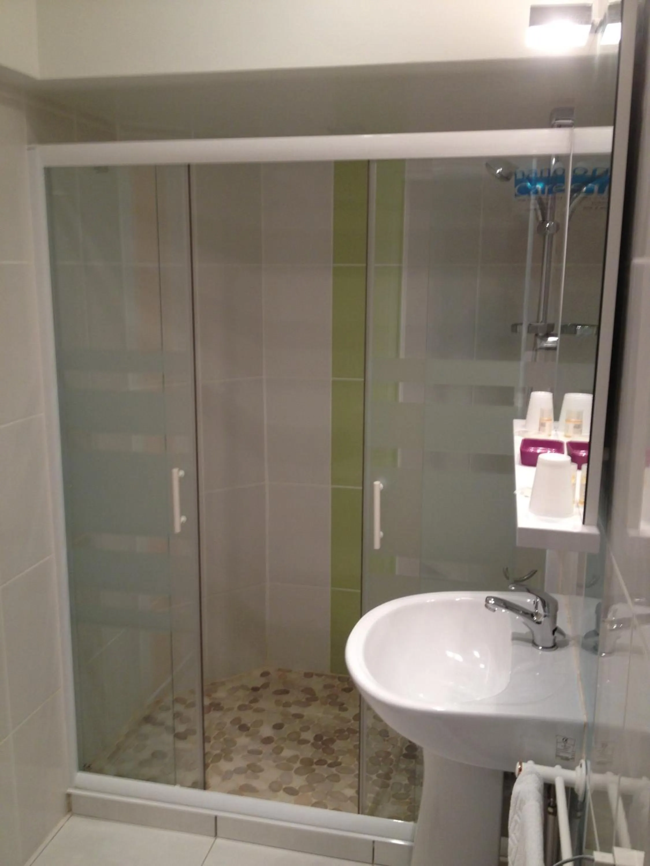 Photo of the whole room in Hotel Couleurs Sud Centre-ville Gare Charleville-Mézières